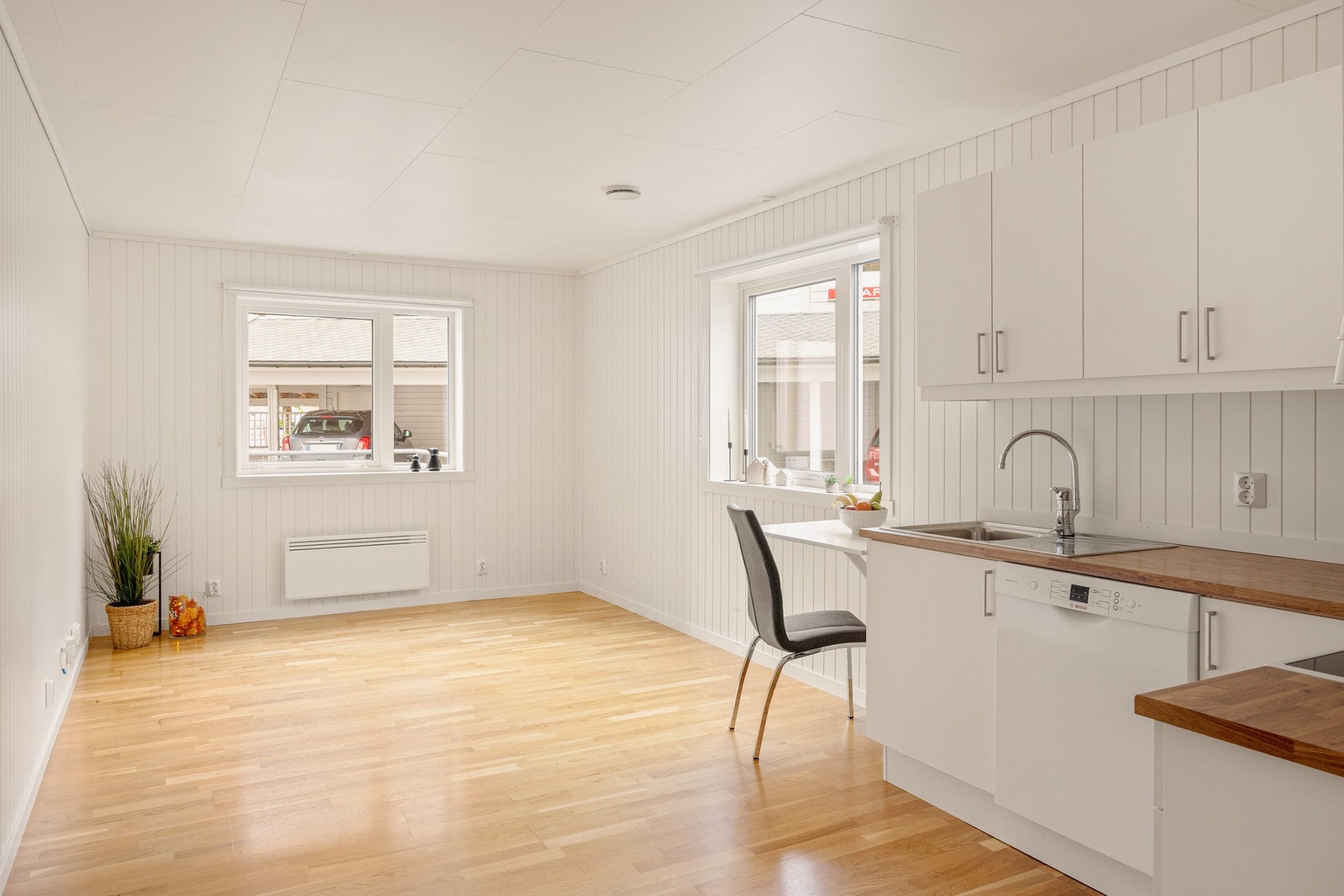 Leilighetens hjerte er den romslige, åpne stue- og kjøkkenløsningen som måler hele 19,7 kvm. Galleribilde