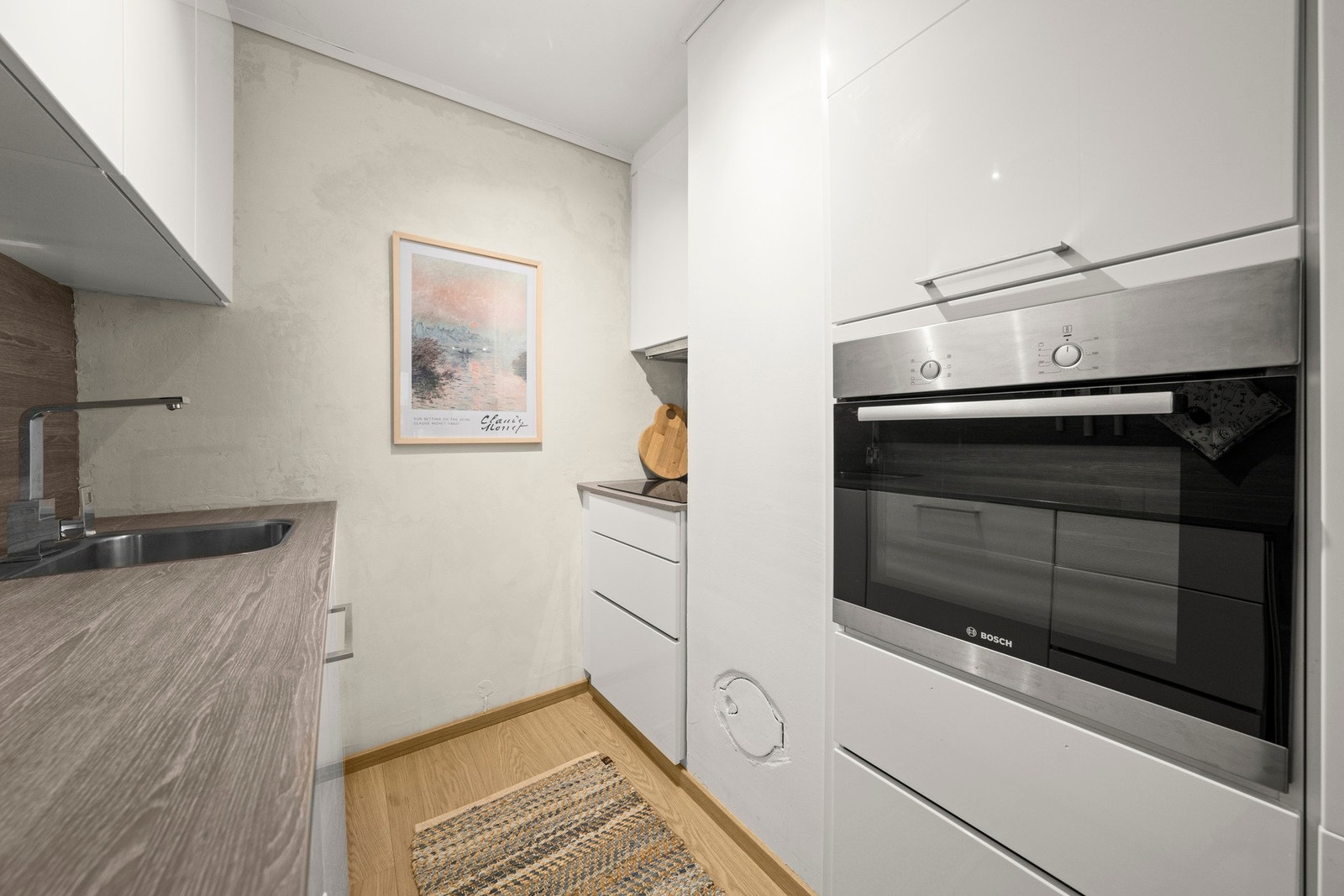 Her har du integrerte hvitevarer som gjør matlagingen enkel og effektiv. Galleribilde