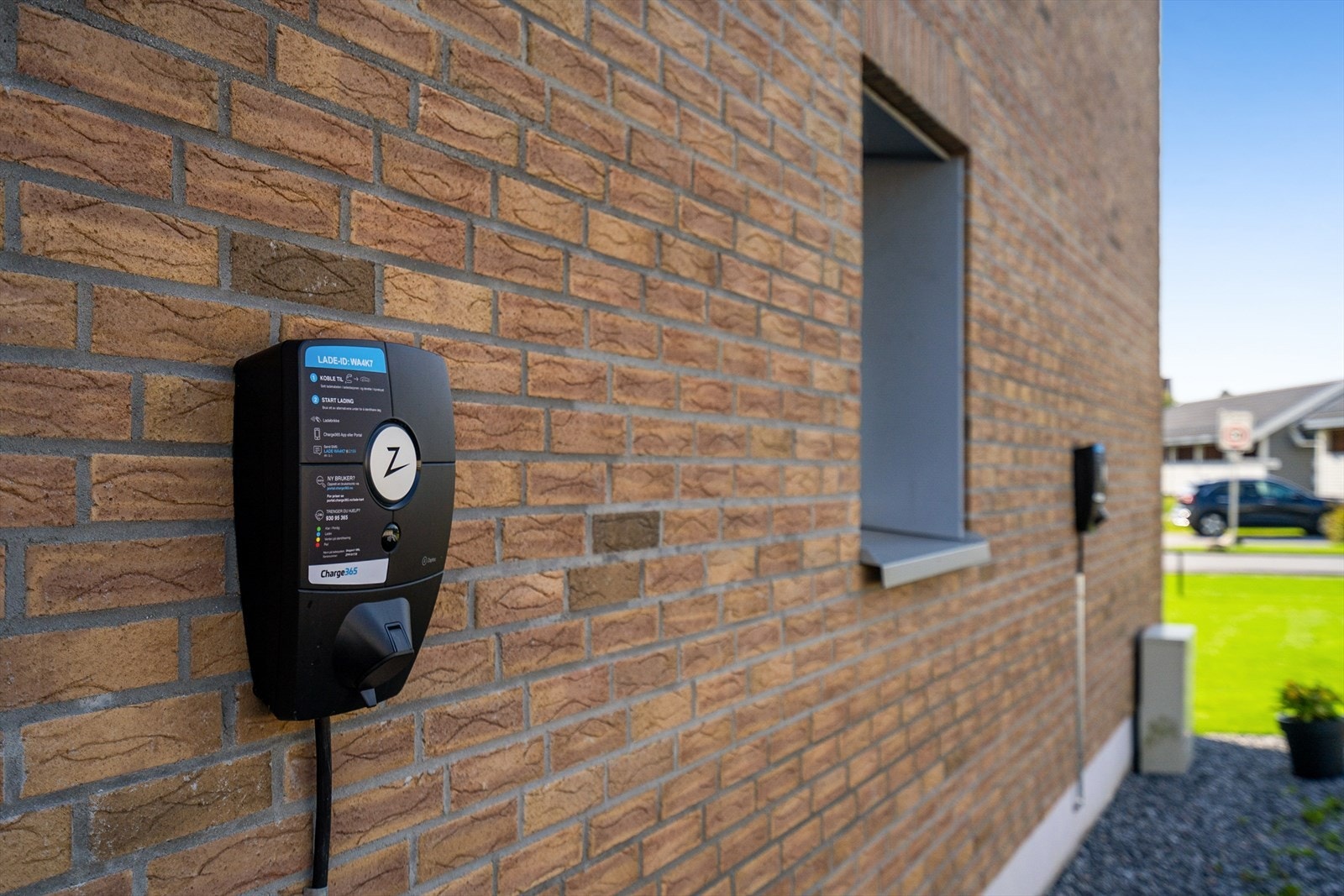 Borettslaget har montert 2 elbil-ladere som kan brukes av beboerne Galleribilde