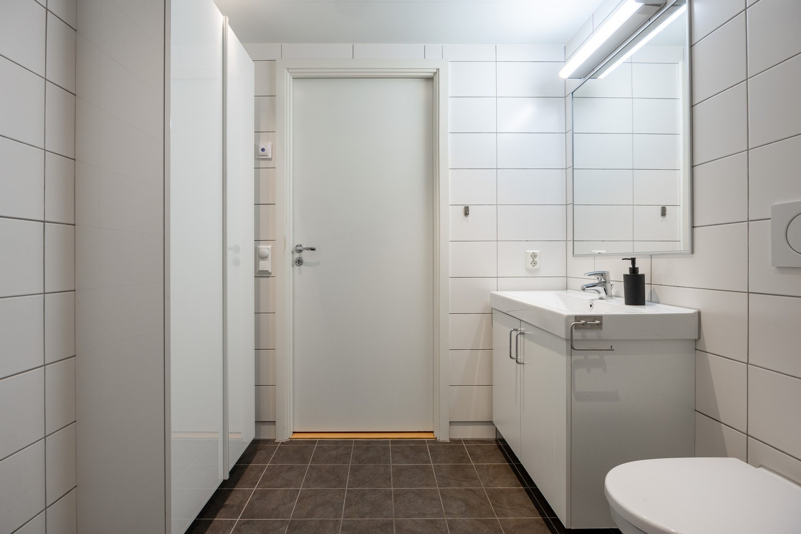 Badet har opplegg for vaskemaskin. Galleribilde