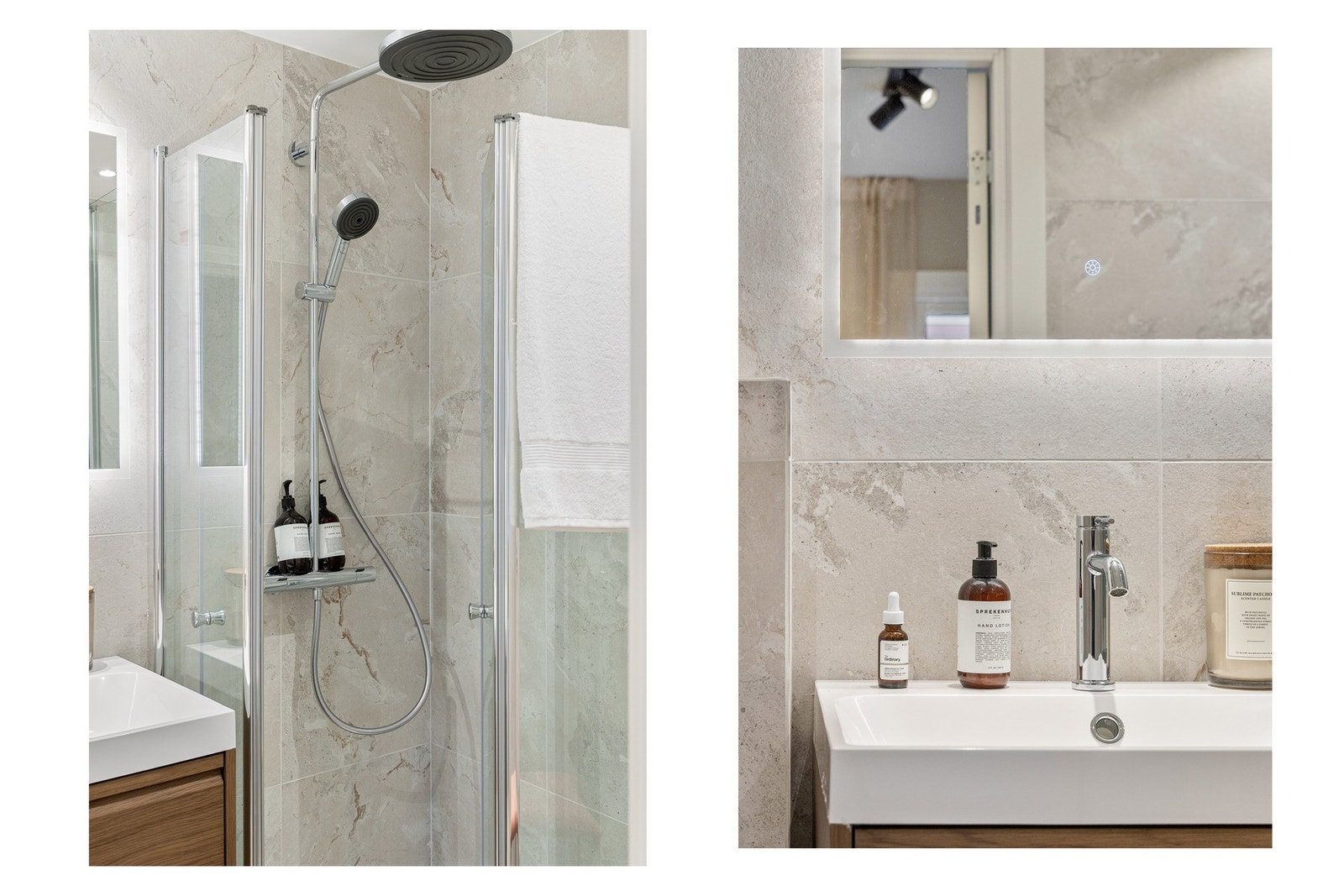 Lekre marmorerte fliser og innredning i finér mørk eik gir et eksklusivt og moderne uttrykk. Galleribilde