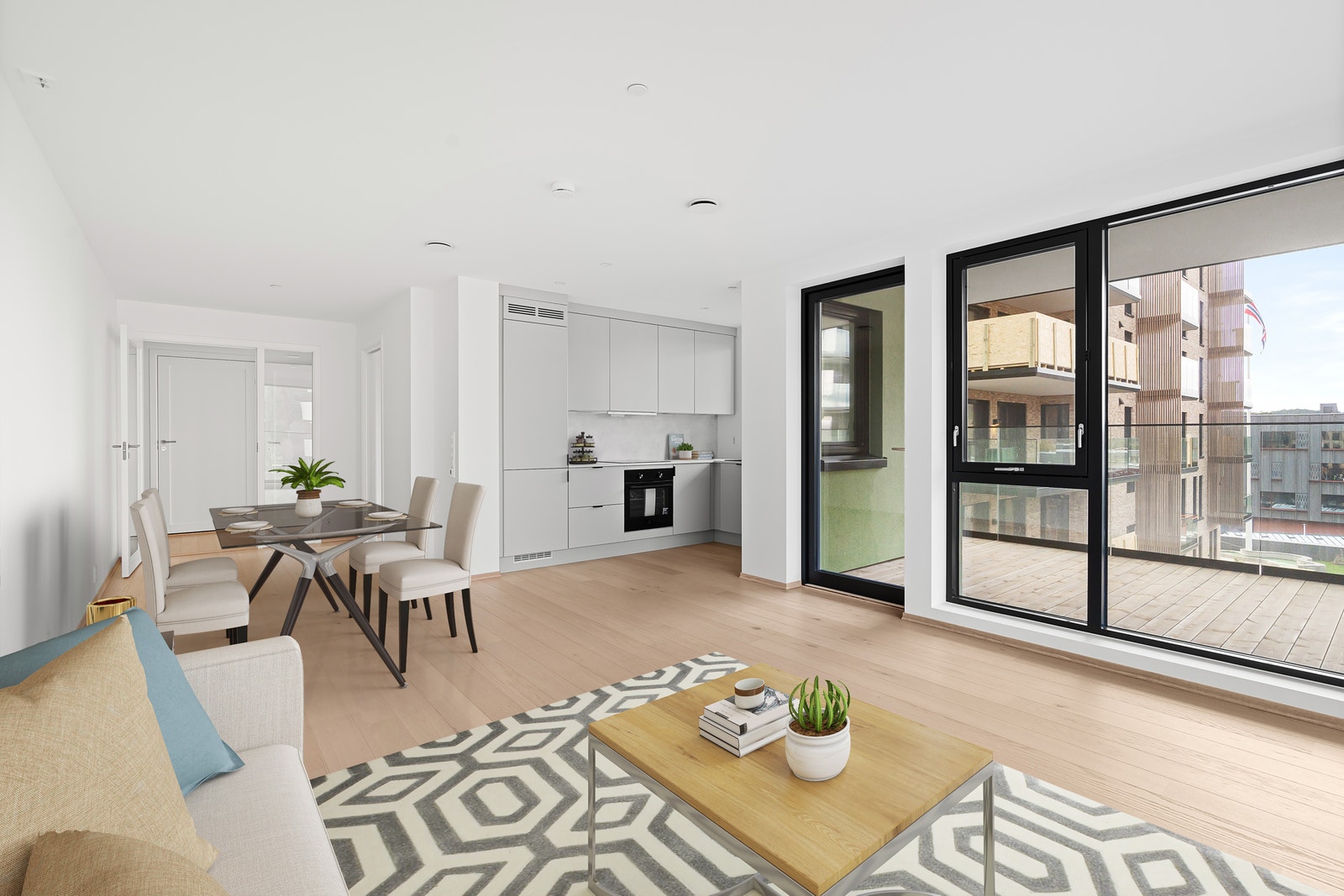 fra stue mot kjøkken, digitalt møblerert. Galleribilde