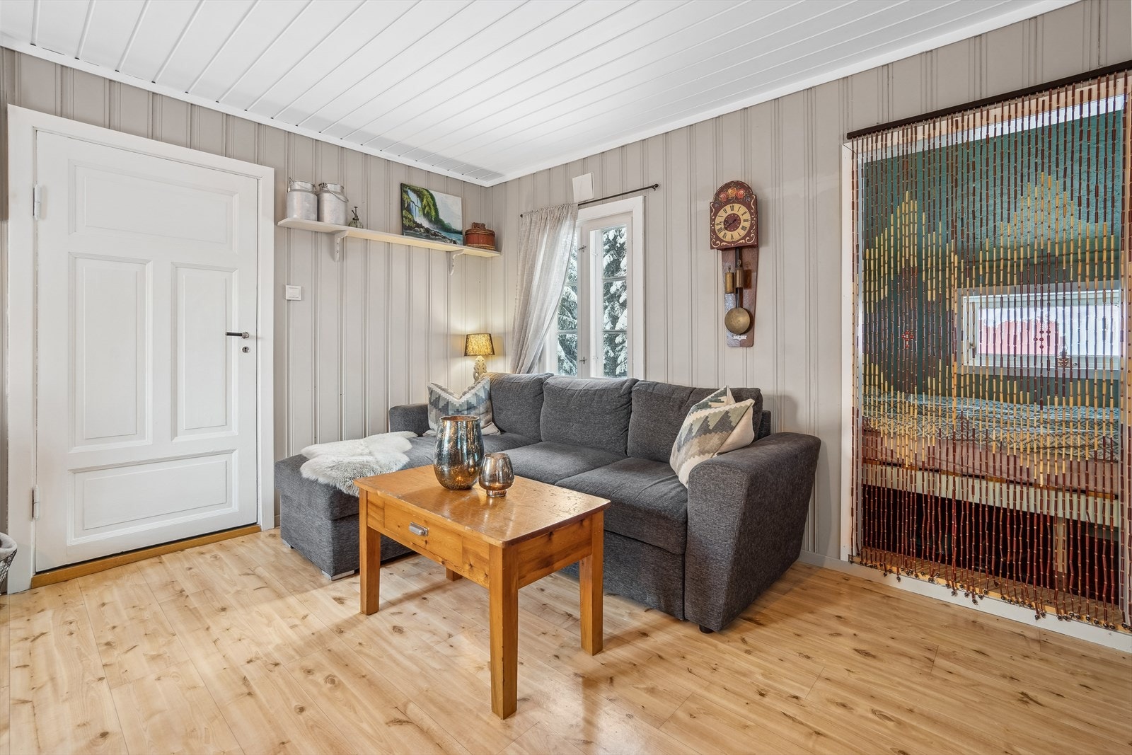 Stuen er malt i lun og delikat farge Galleribilde