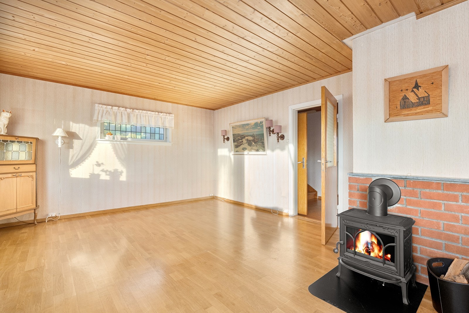 Vedovn i stuen gir effektiv oppvarming. Galleribilde
