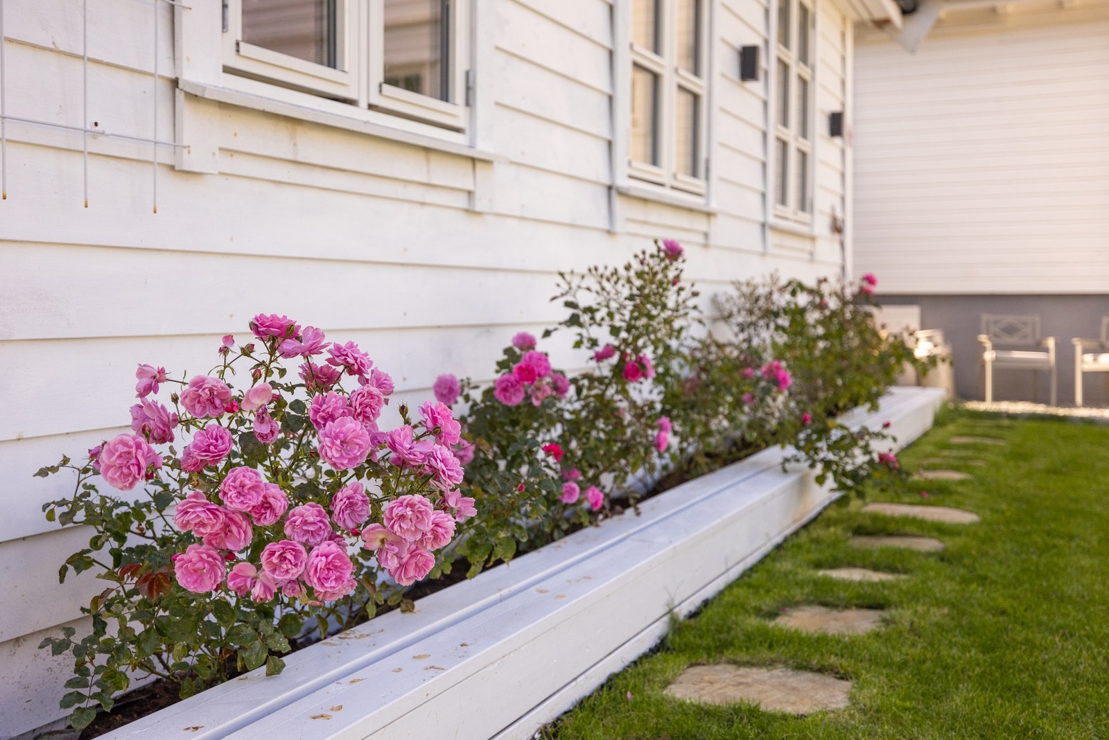 Hagen er omgitt av nydelig beplantning. Galleribilde