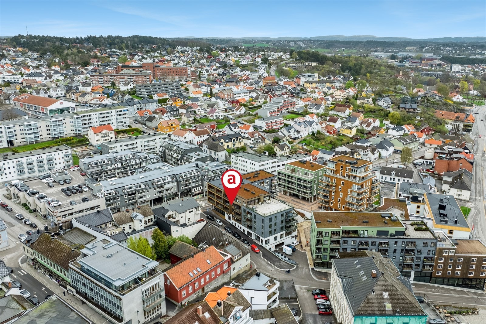 Dronefoto som viser leilighetens beliggenhet Galleribilde