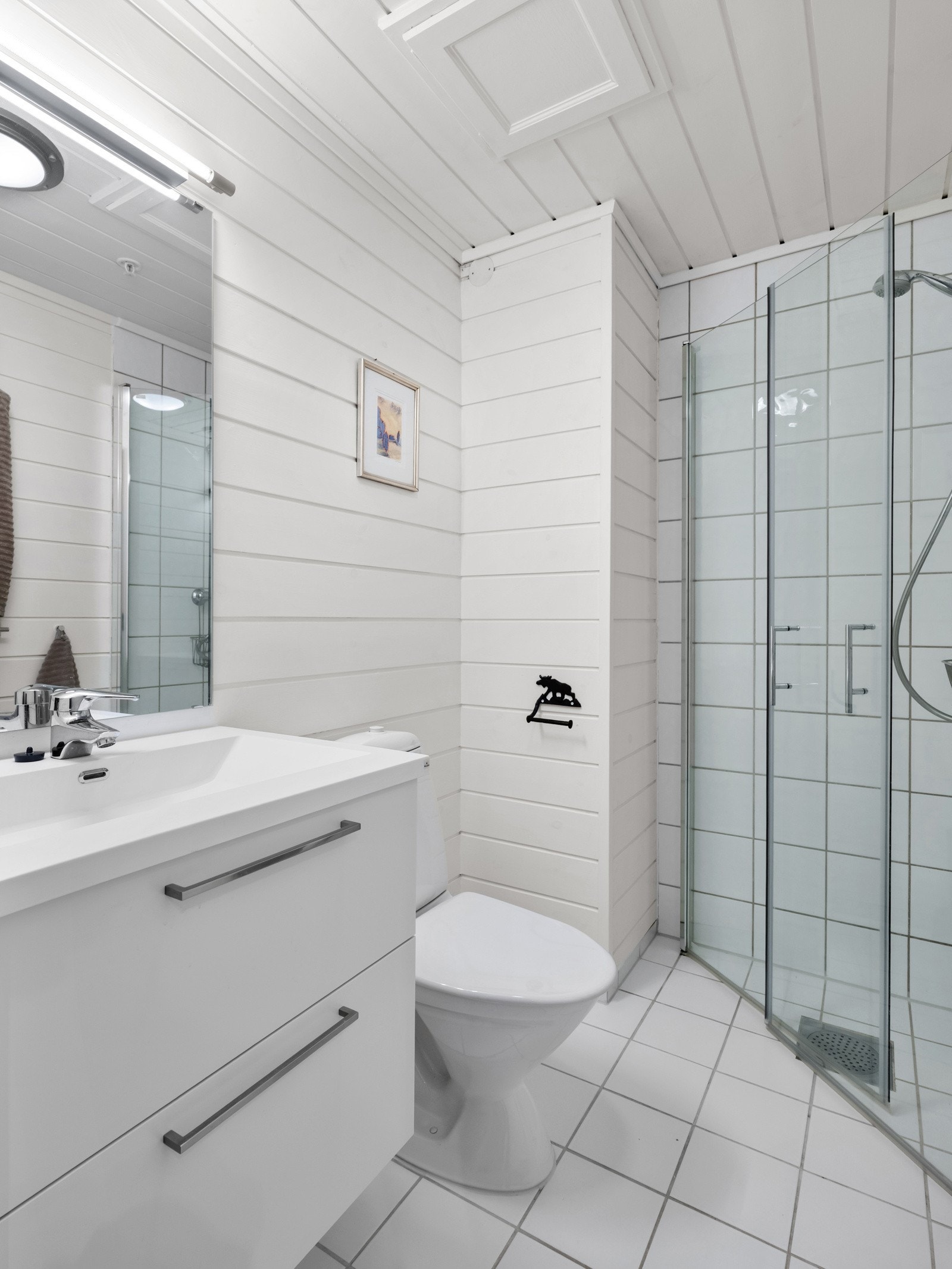 Fliselagt gulv og dusjsone Galleribilde