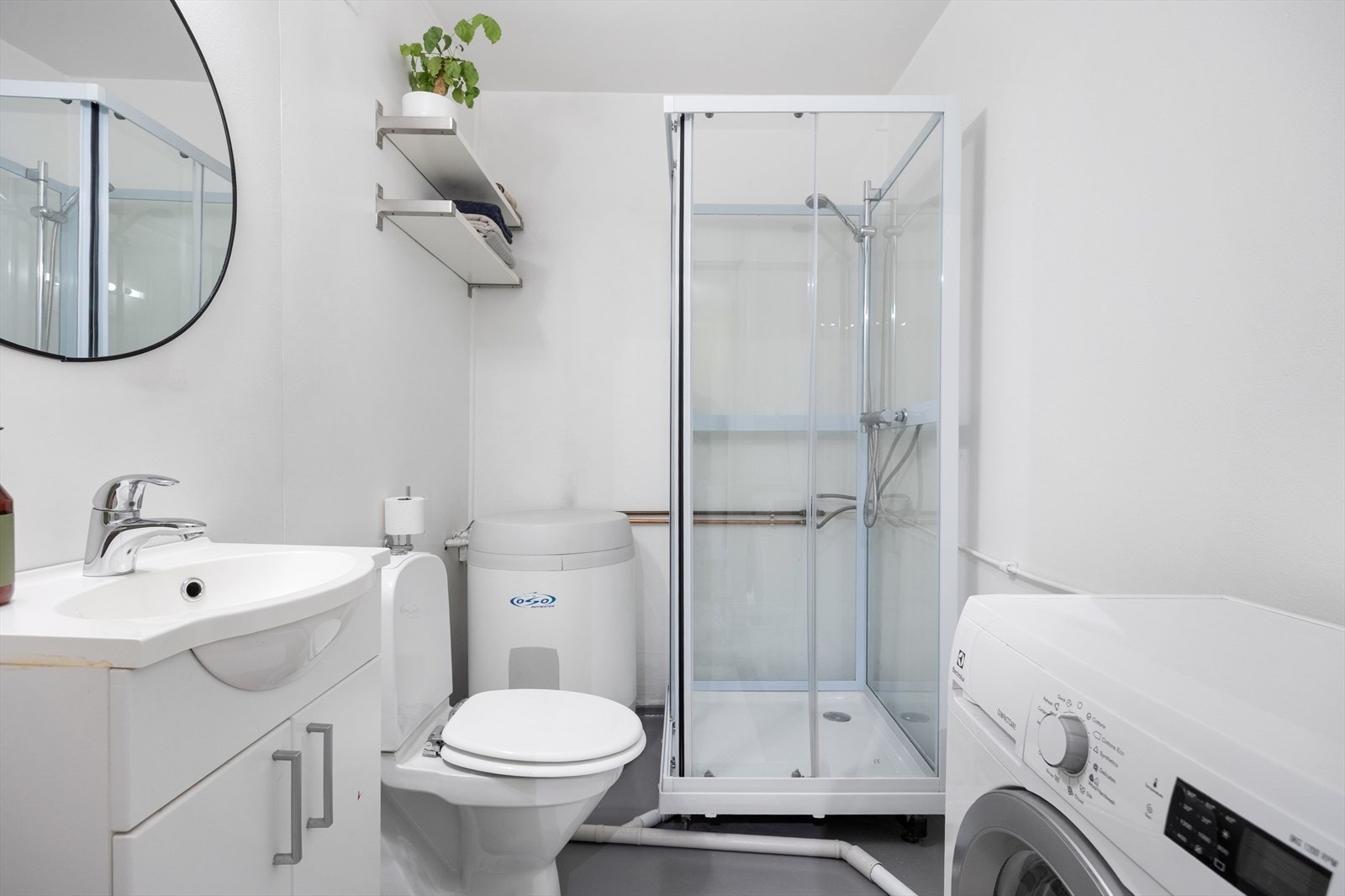 Det er opplegg for vaskemaskin på badet. Galleribilde