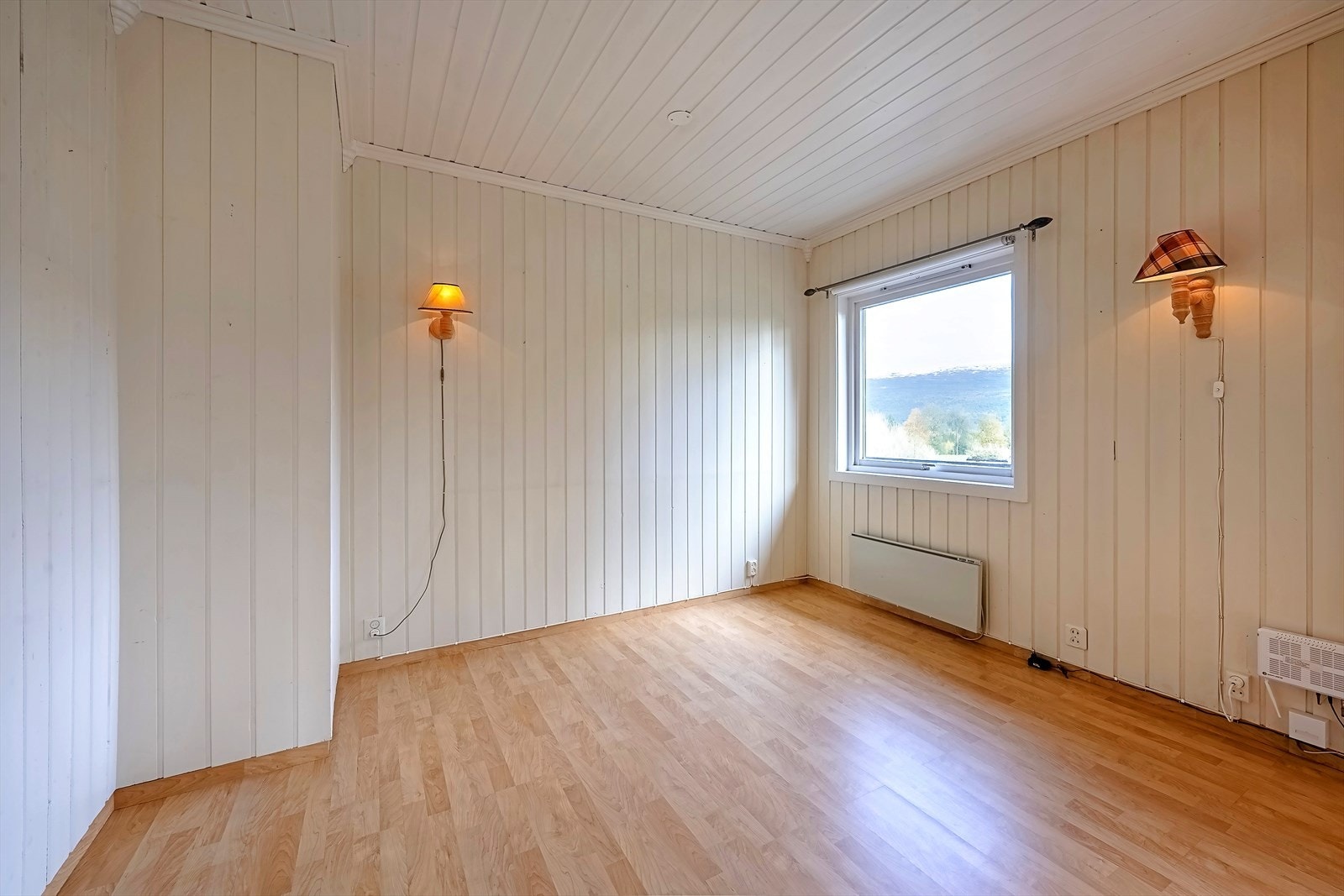 Denne delen av stua var opprinnelig et soverom som kan tilbakeføres uten at dette må omsøkes Galleribilde