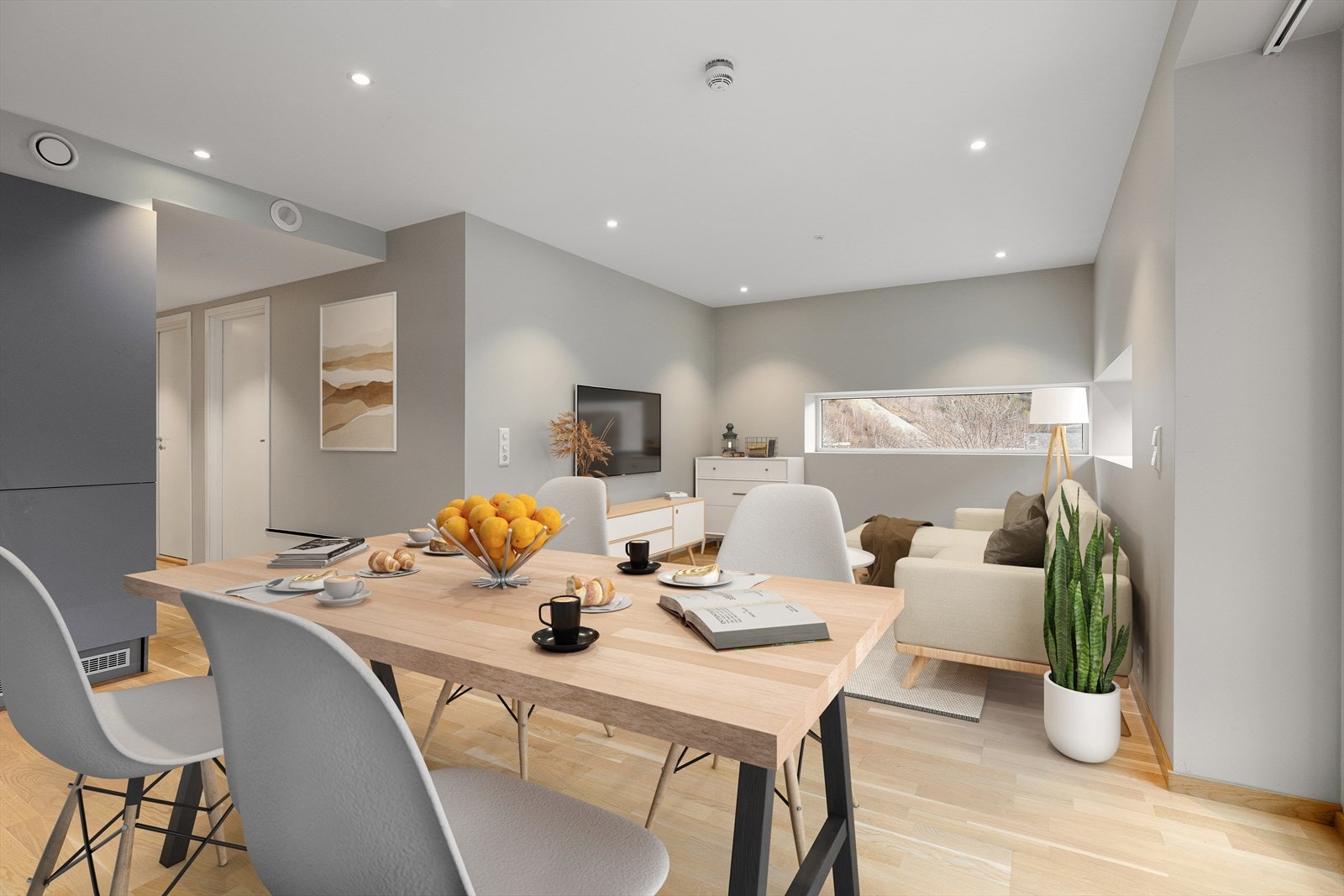 Stova er av god størrelse og gir plass til både spisebord og sofagruppe. Galleribilde