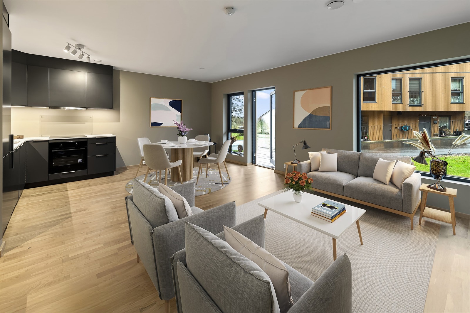 Stue med åpen kjøkkenløsning- Galleribilde