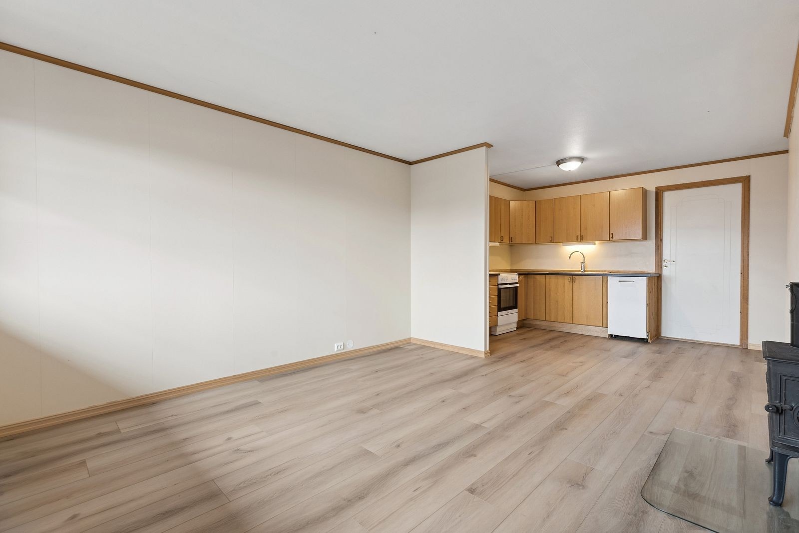 Stue og kjøkken i åpen løsning Galleribilde