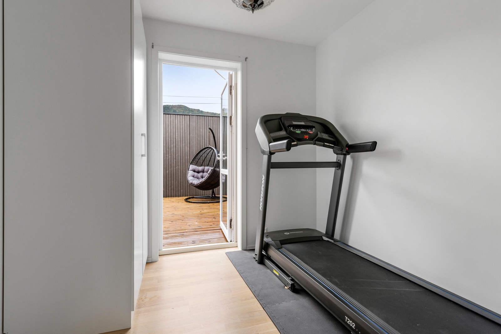 Det andre soverommet blir i dag benyttet som treningsrom. Galleribilde