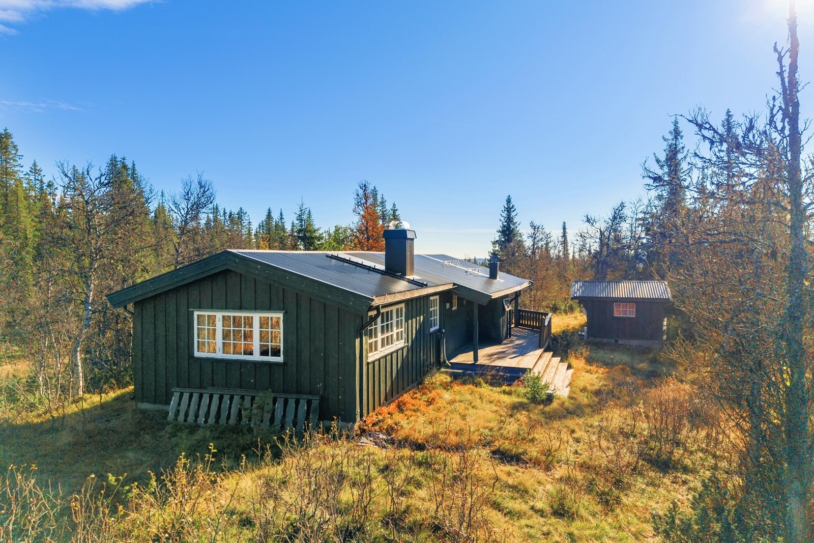 Fritidseiendom, bebygget med hytte og utebod fra 1969. Galleribilde