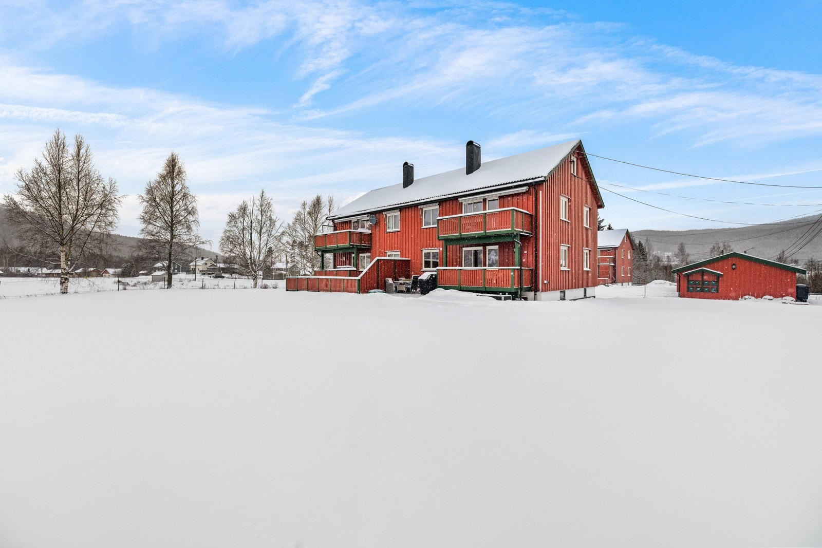 Felleshageareal for beboerne med god plass til lek og rekreasjon. Galleribilde