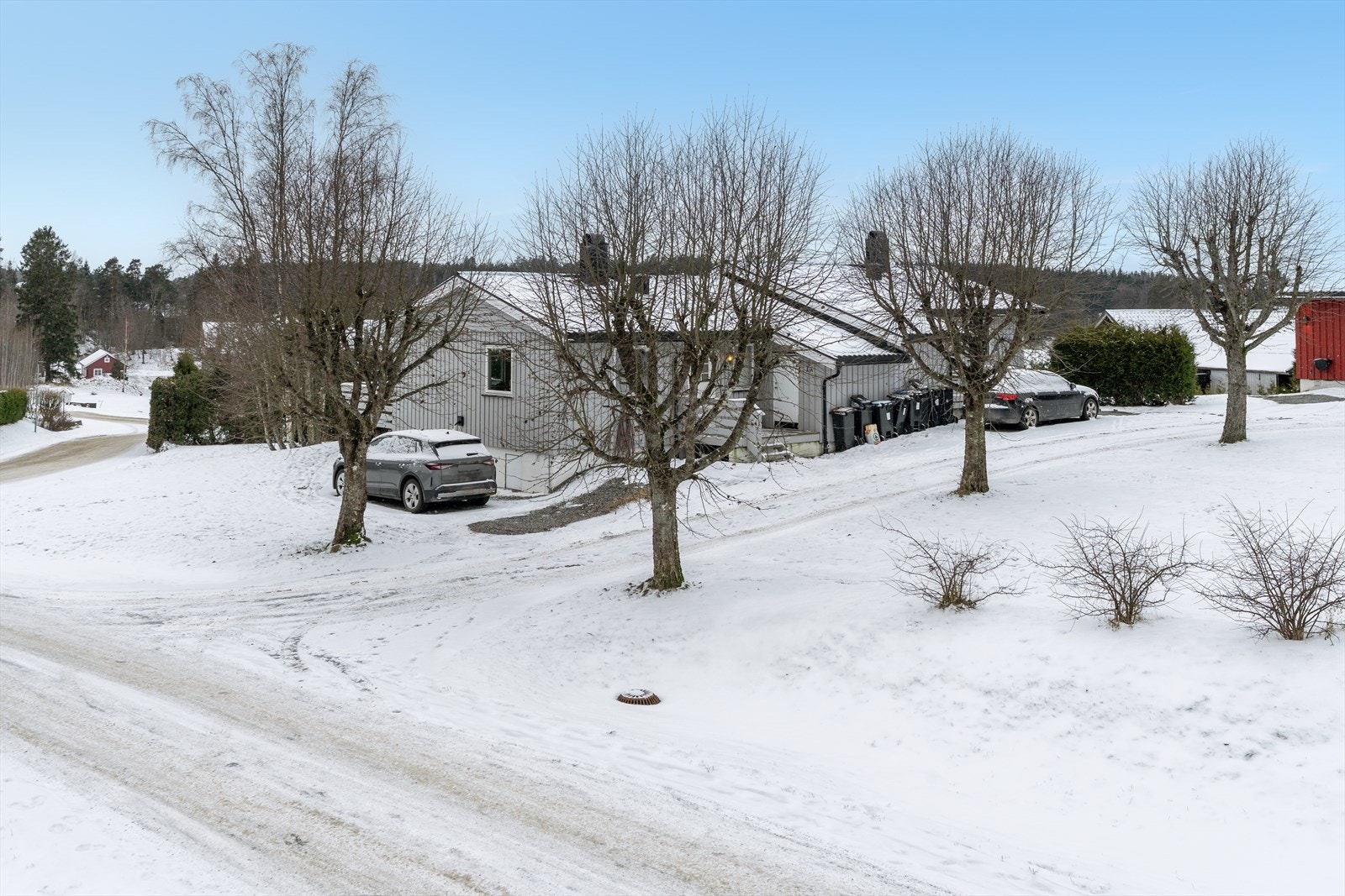 Borettslaget har også en felles parkeringsplass Galleribilde