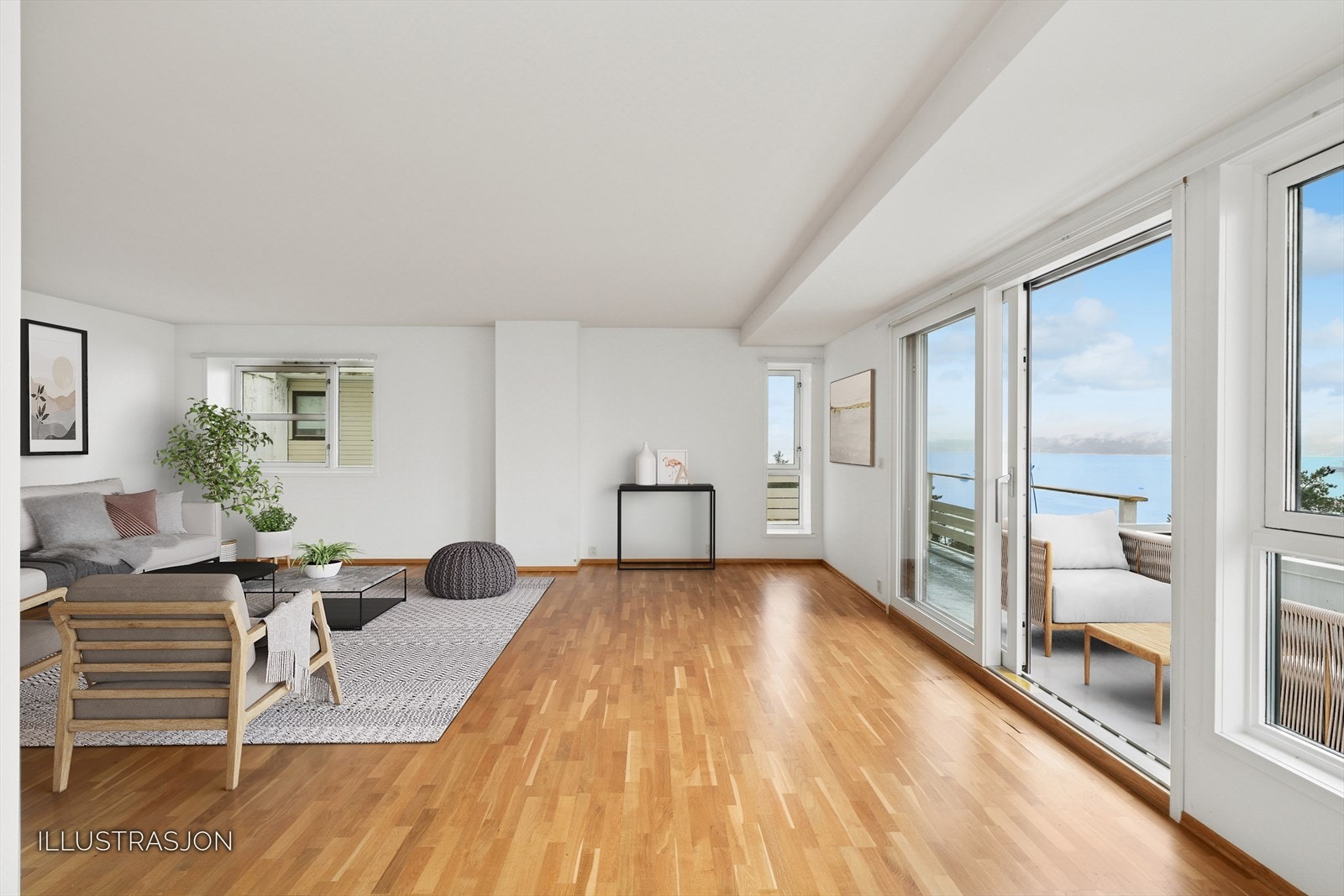 Store vindusflater mot vest som sørger for godt med naturlig lys. Her kan du nyte vakre solnedganger fra egen stue. Galleribilde