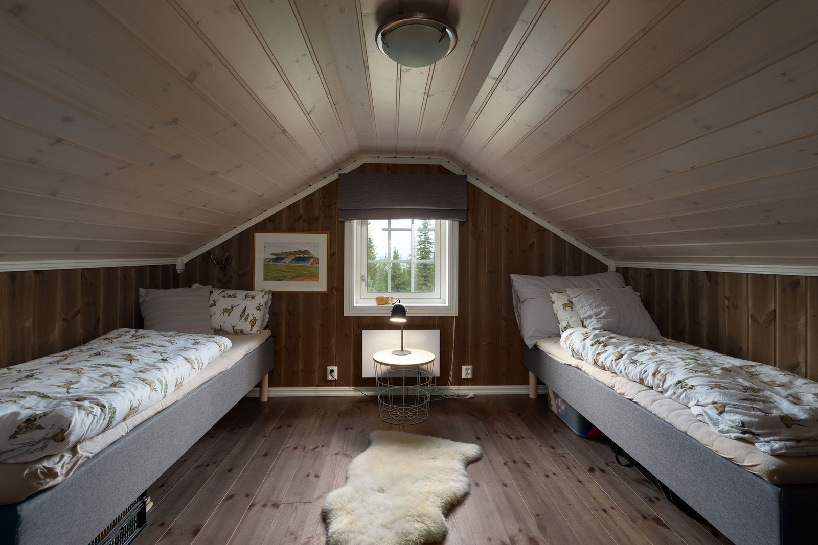 Ett av to soverom i loftsetasjen. Galleribilde