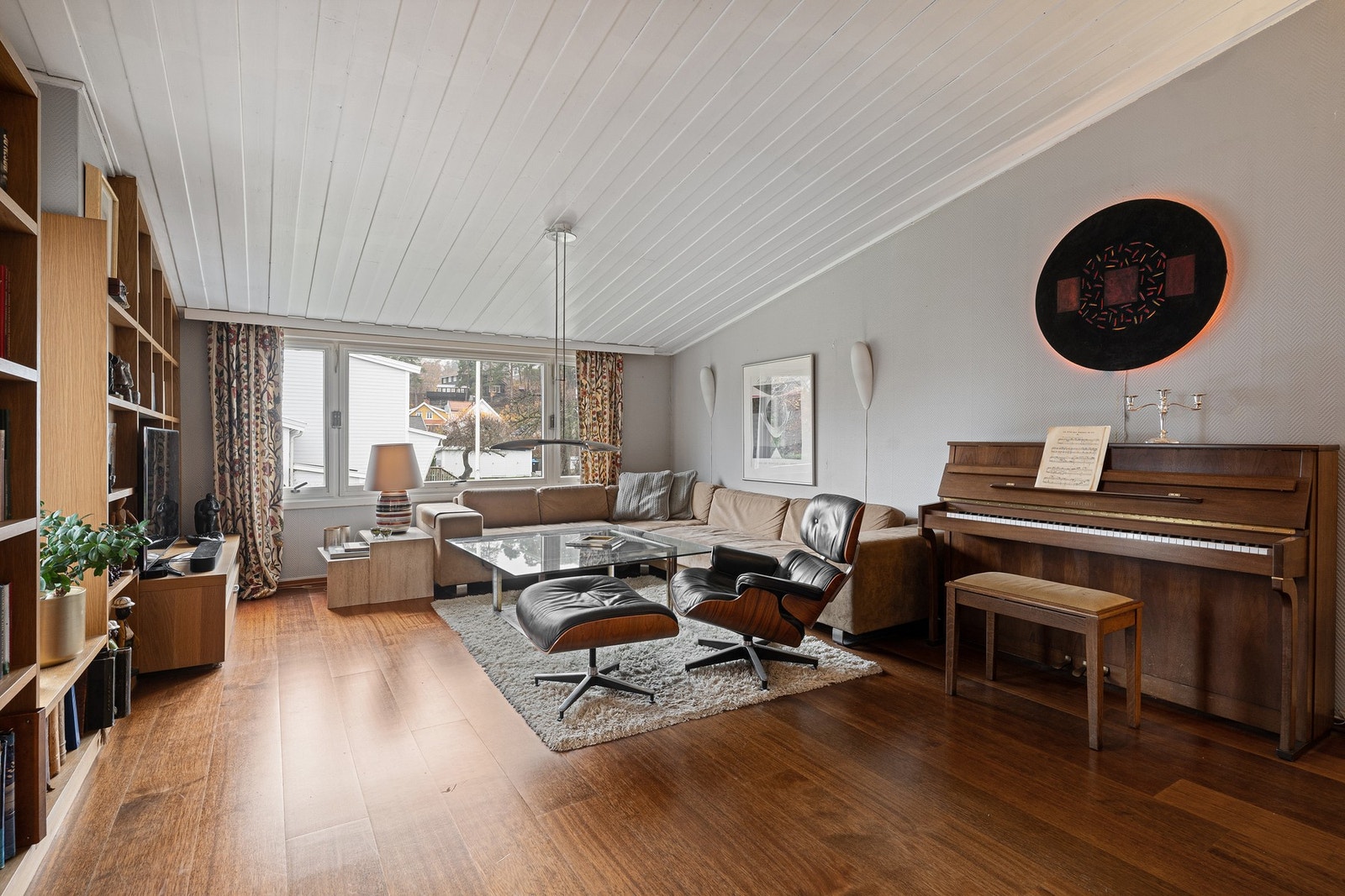 Her får du en romfølelse som inviterer til både avslapning og sosialt samvær. Galleribilde