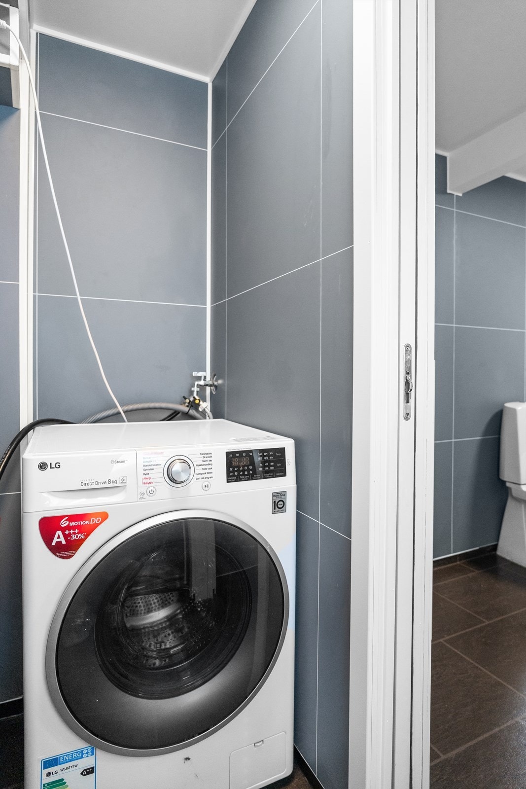 Egen krok til vaskemaskin og tørketrommel. Galleribilde