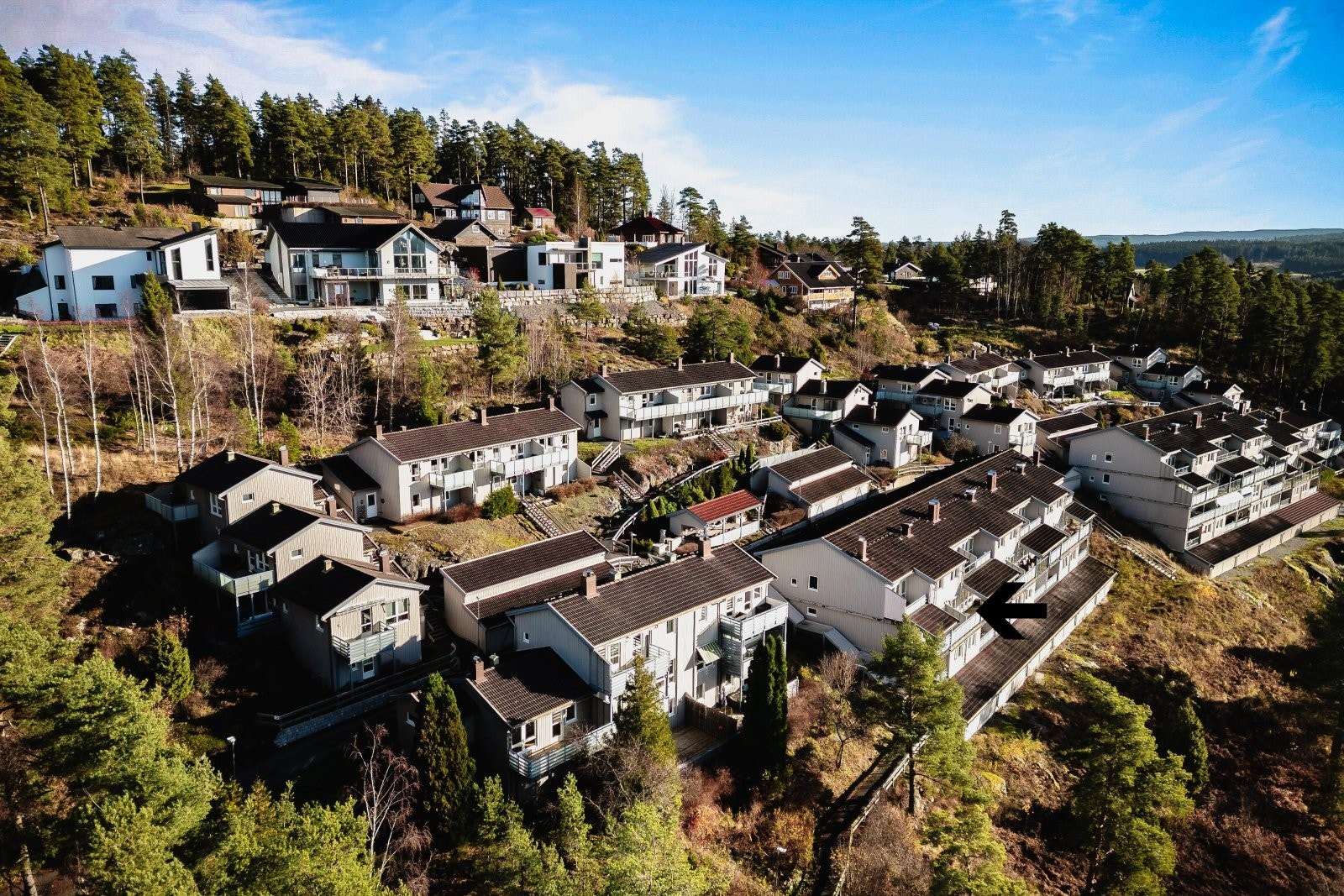 Sort pil viser omtrentlig plassering Galleribilde