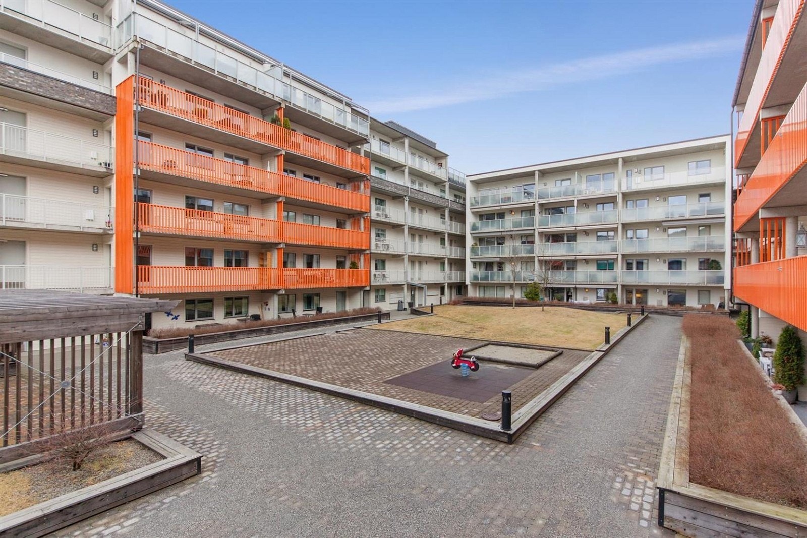 Leiligheten har tilgang til felles atrium Galleribilde