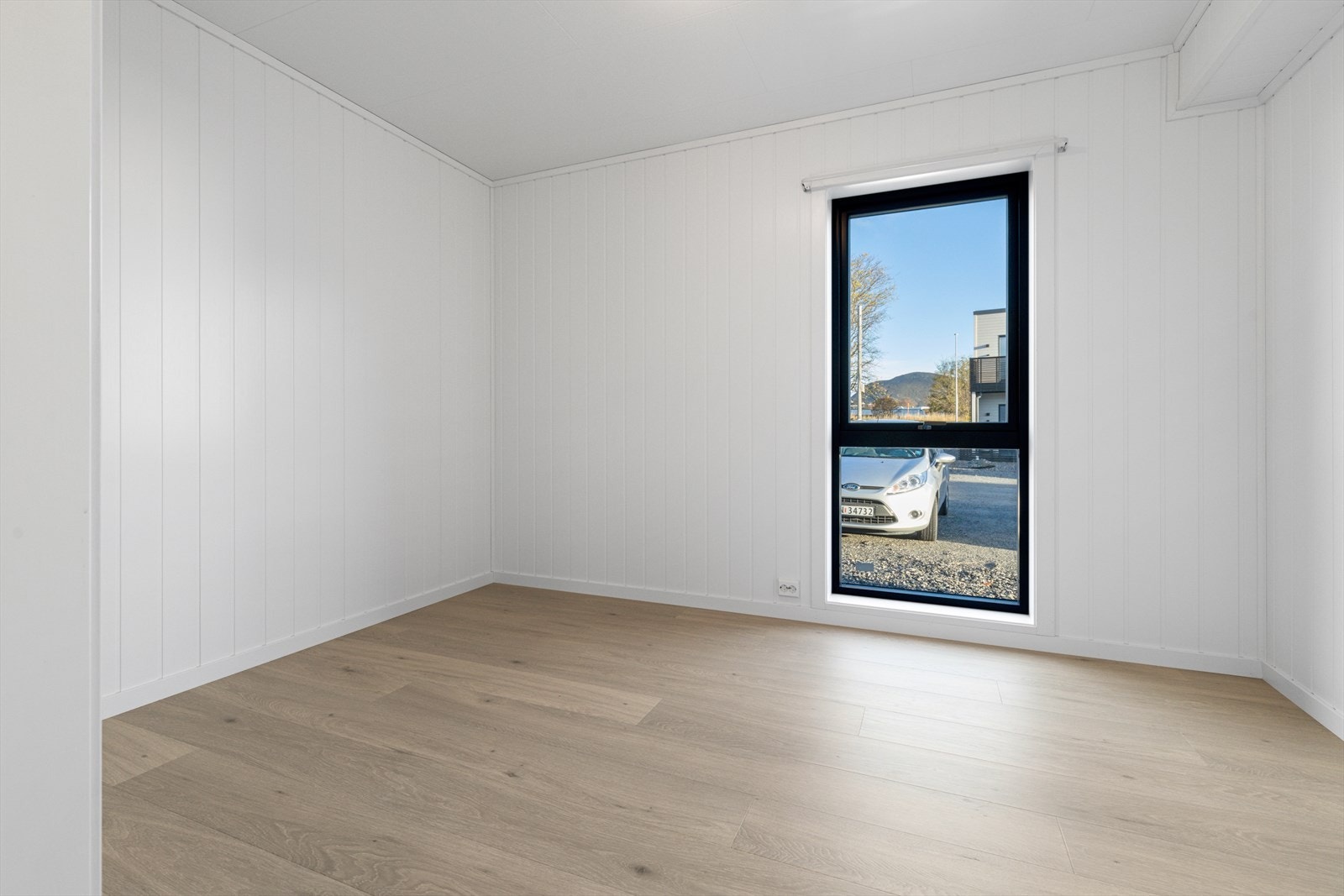 Lyst og fint hovedsoverom Galleribilde