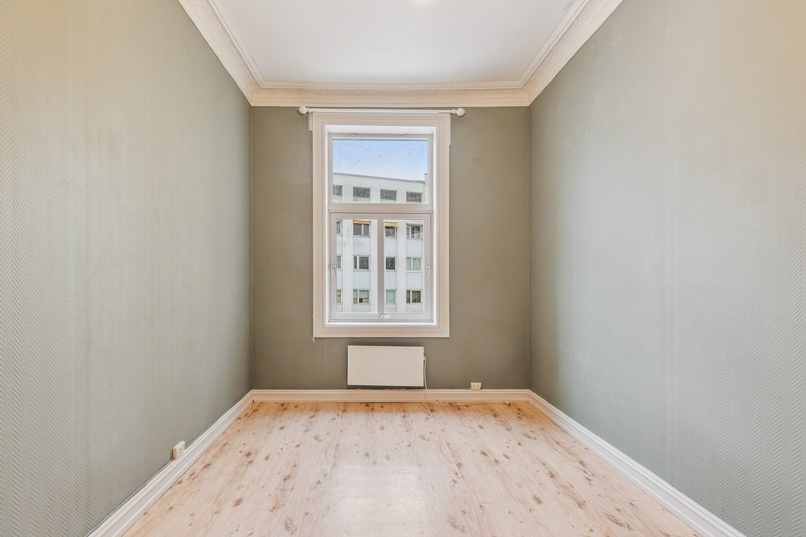 Soverom 2, samt kjøkkenet vender mot bakgård. Galleribilde