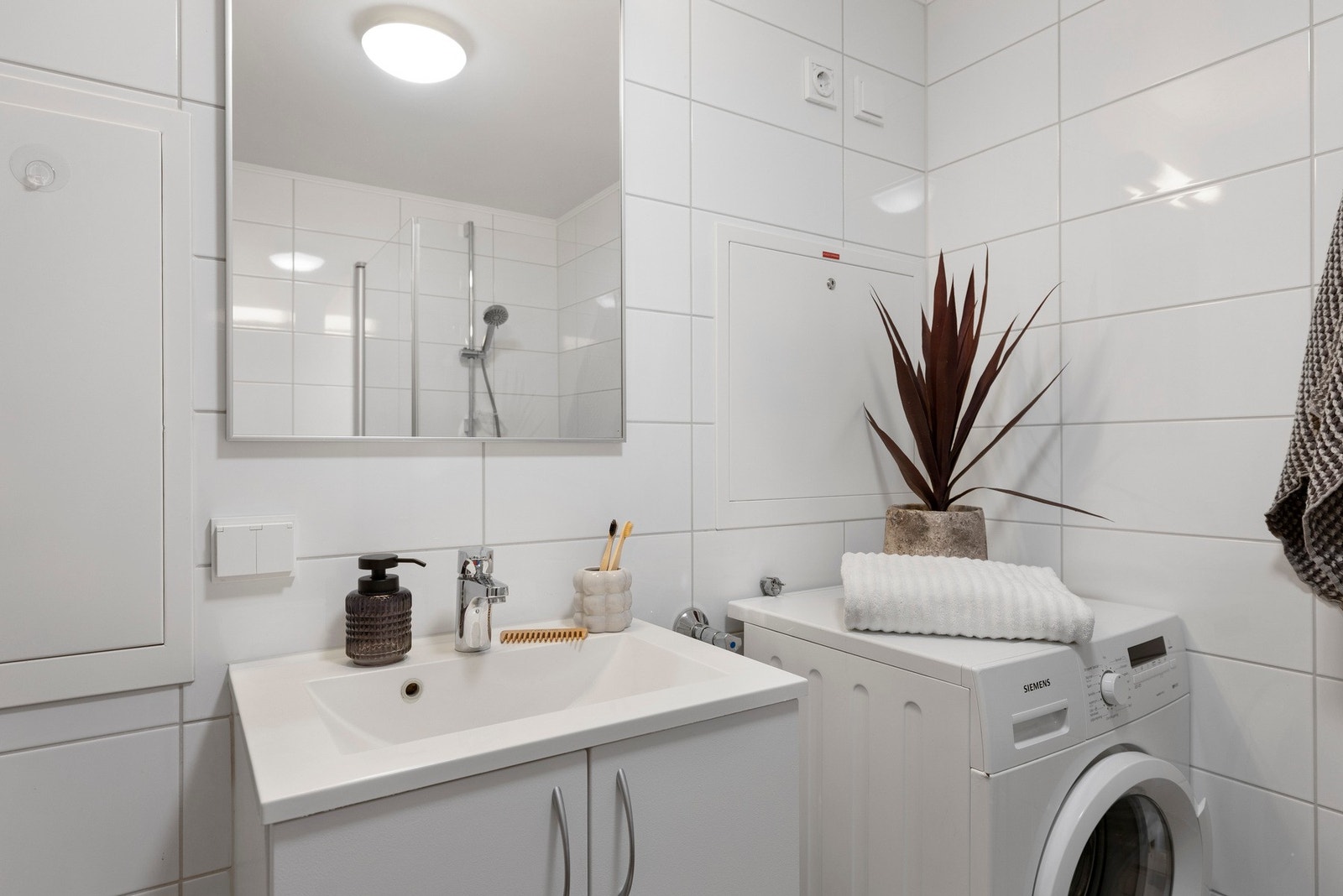 Det er opplegg for vaskemaskin. Galleribilde