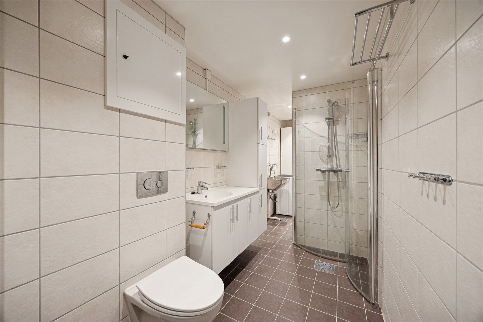 Flislagt baderom, rehabilitert i regi av borettslaget i 2019. Galleribilde