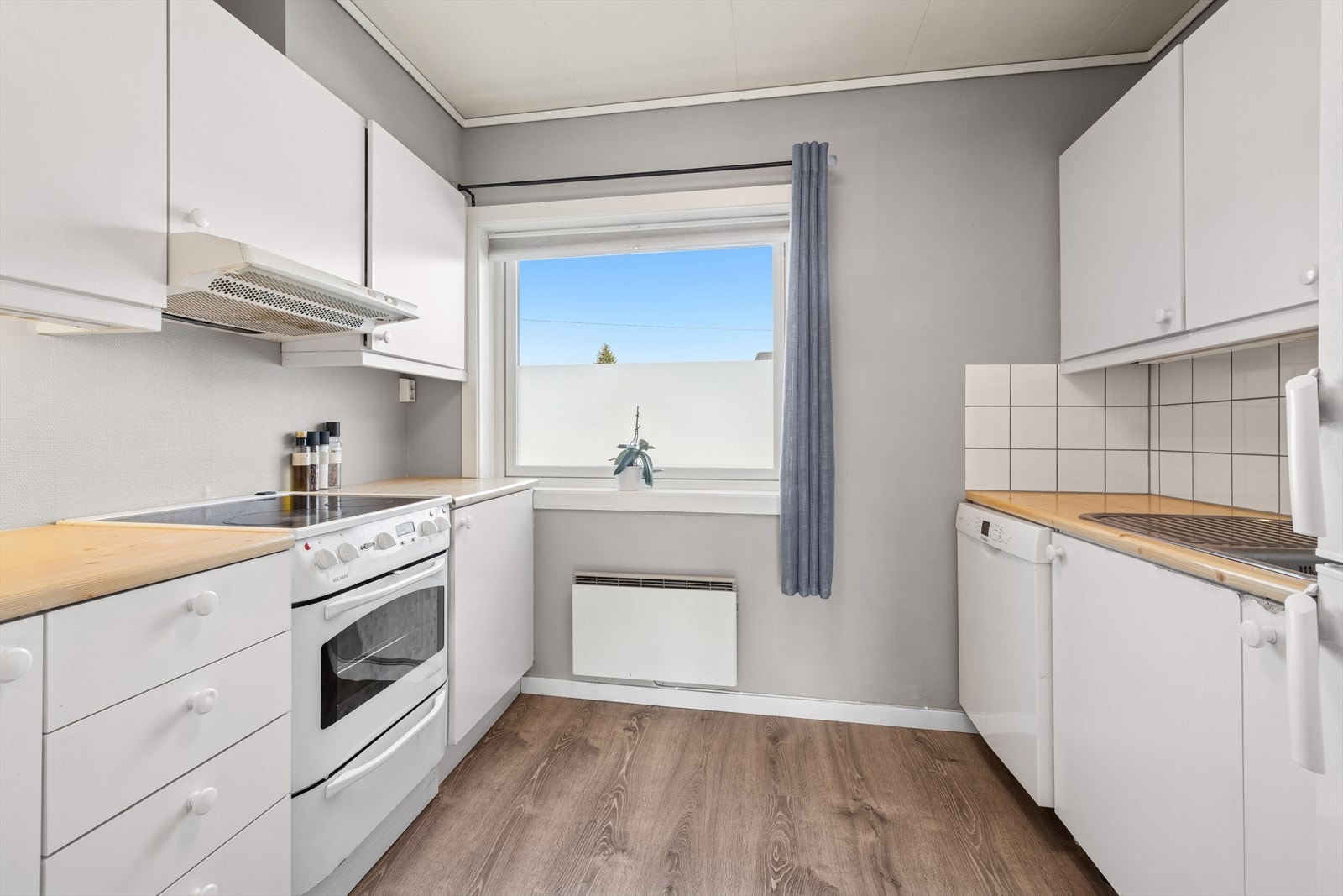 Kjøkkenet er plassert separat fra stuen. Galleribilde