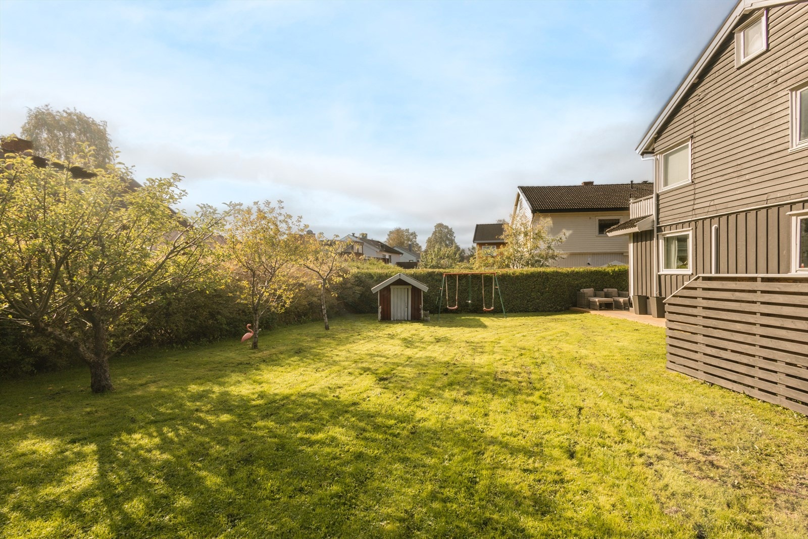 En stor og velholdt gressplen gir mange muligheter for utendørsaktiviteter. Galleribilde