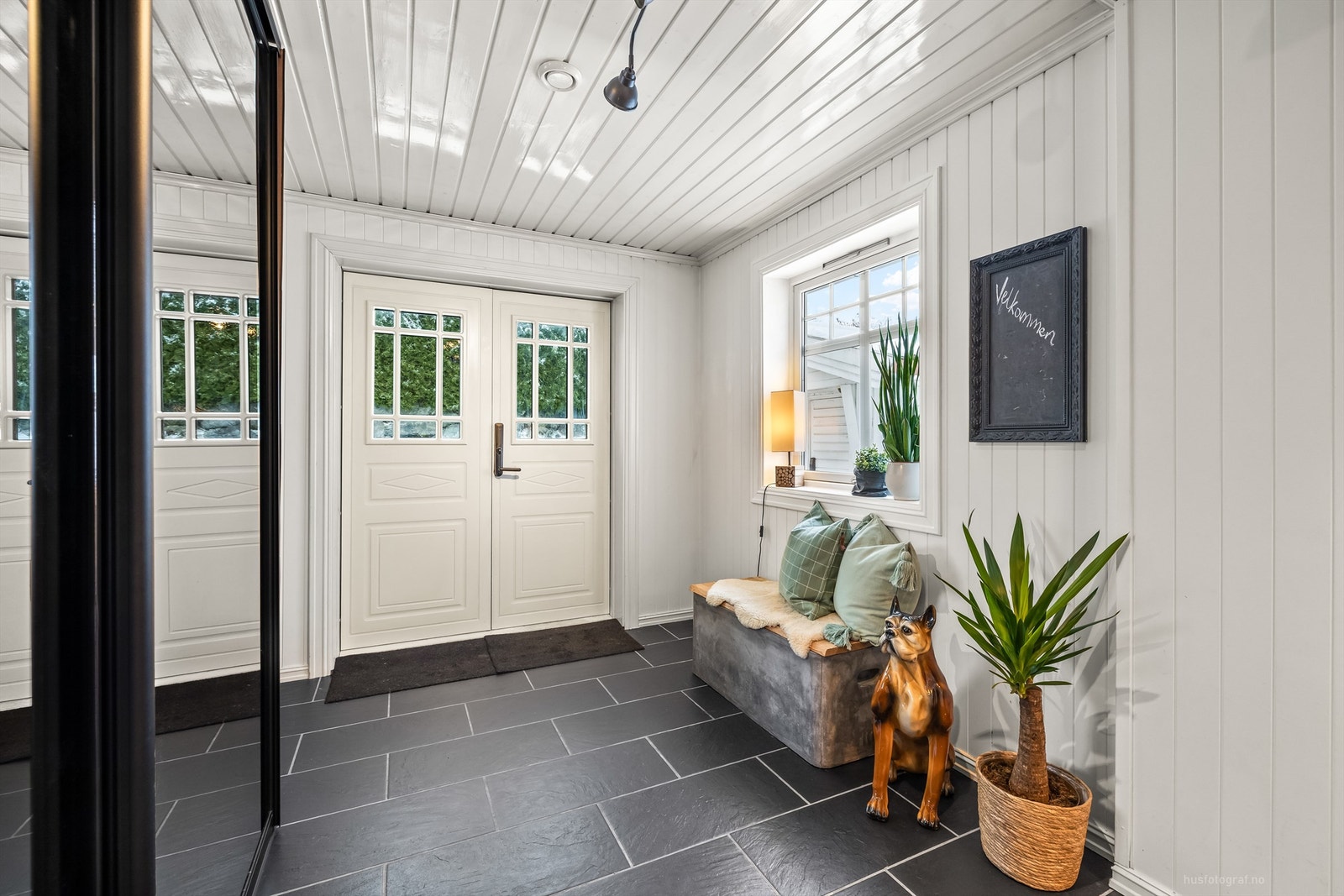 Det er gulvvarme i entréen Galleribilde