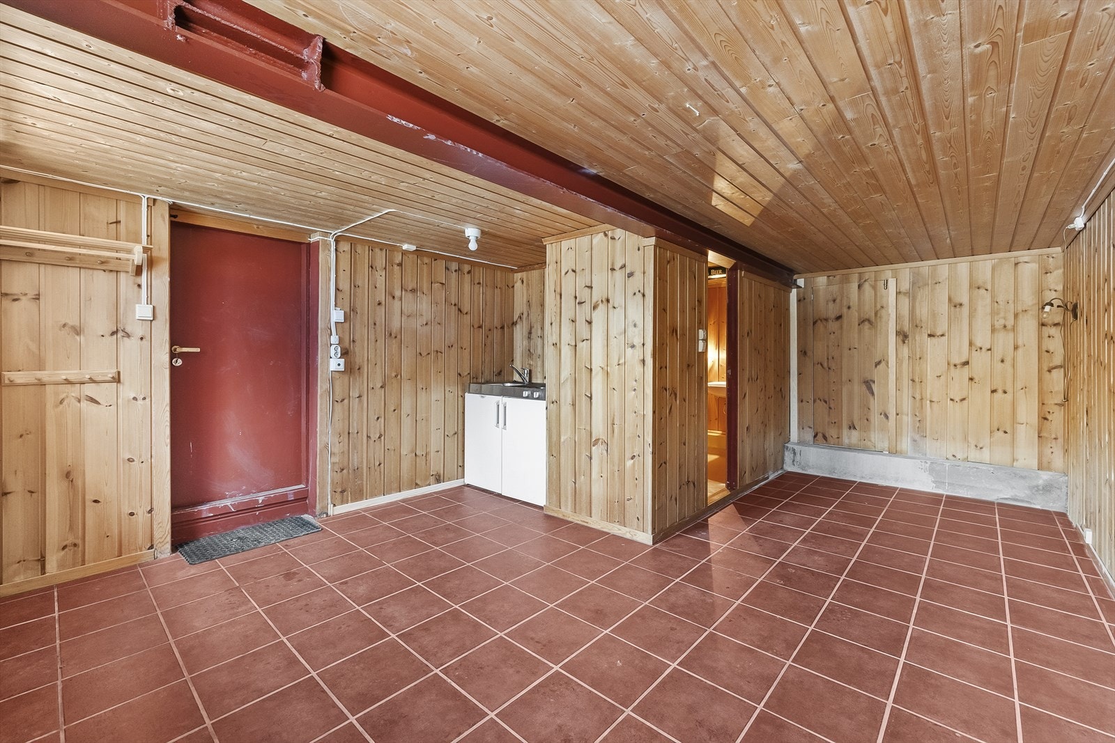 Romslig stue/alkove med kjøkkenløsning Galleribilde