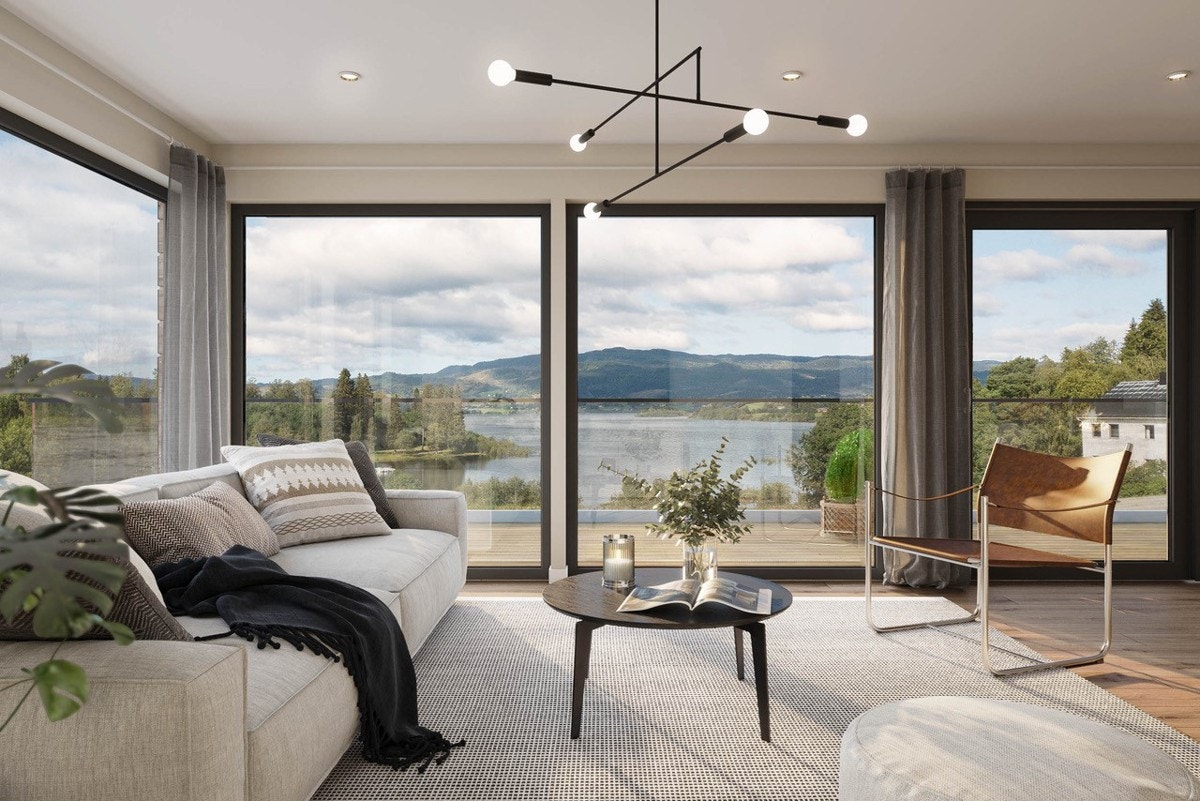 Romslig stue med fantastisk utsikt! Store vindusflater sørger for rikelig med naturlig lysinnslipp. Galleribilde