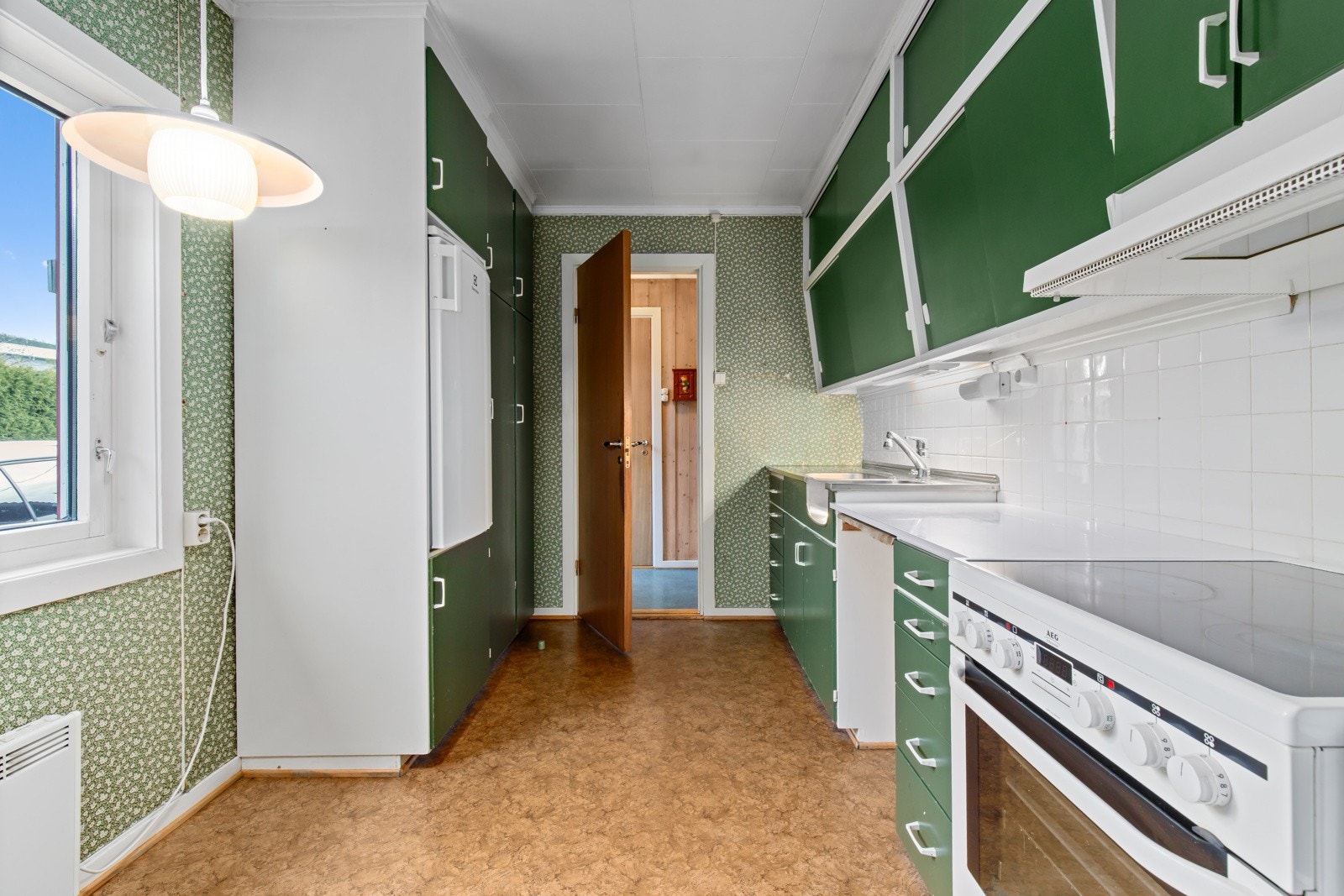 Her finner man en eldre plassbygd innredning. Galleribilde