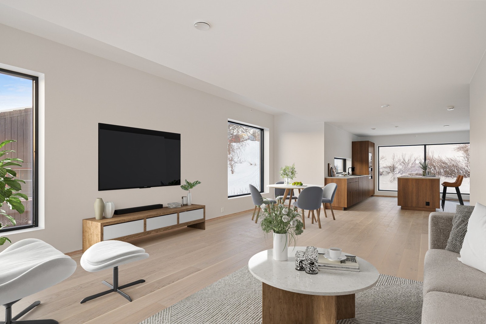 Lys og romslig stue/kjøkken på hele 64 kvm med store vindusflater. Galleribilde