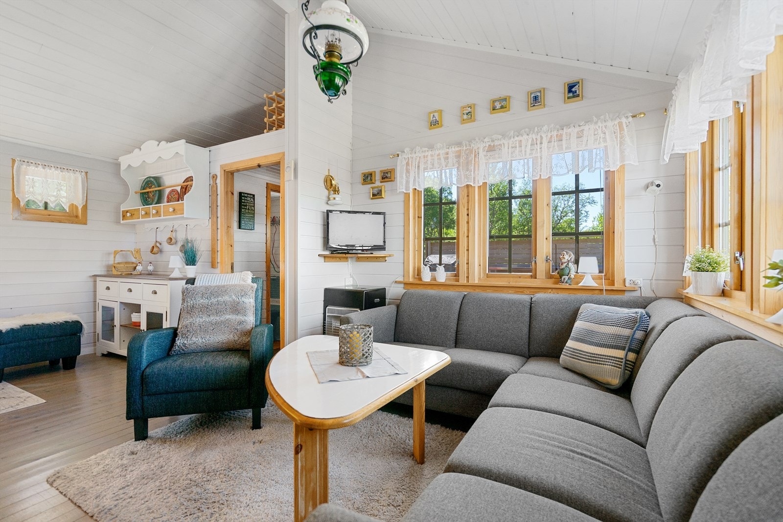 Stue med koselig sofakrok Galleribilde