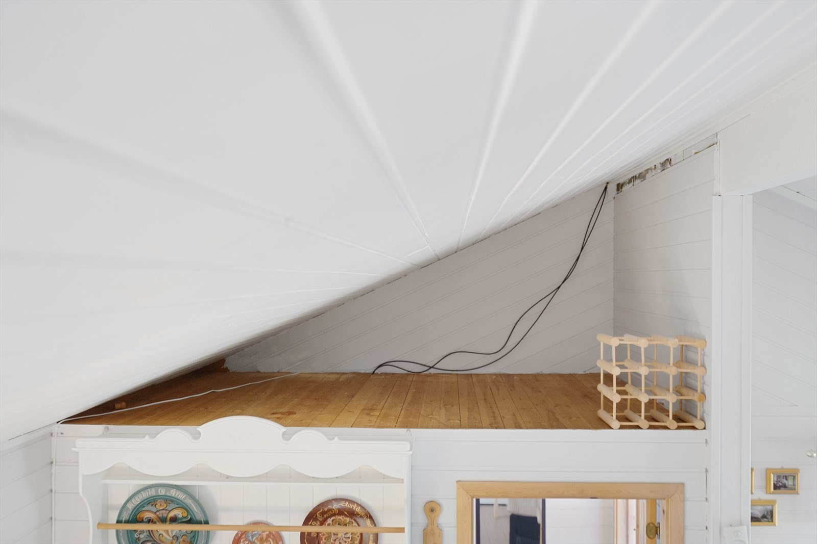 Praktisk hems for oppbevaring Galleribilde