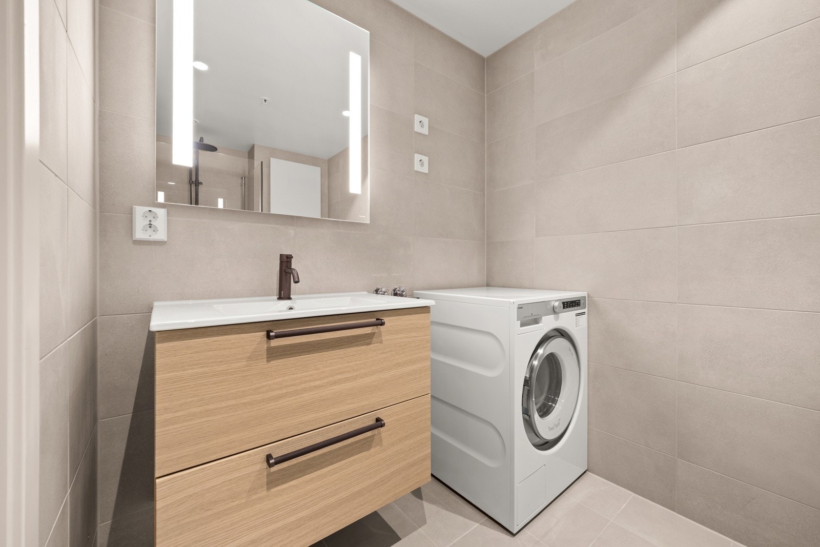 Badet ved entreen har også opplegg for vaskemaskin. Galleribilde