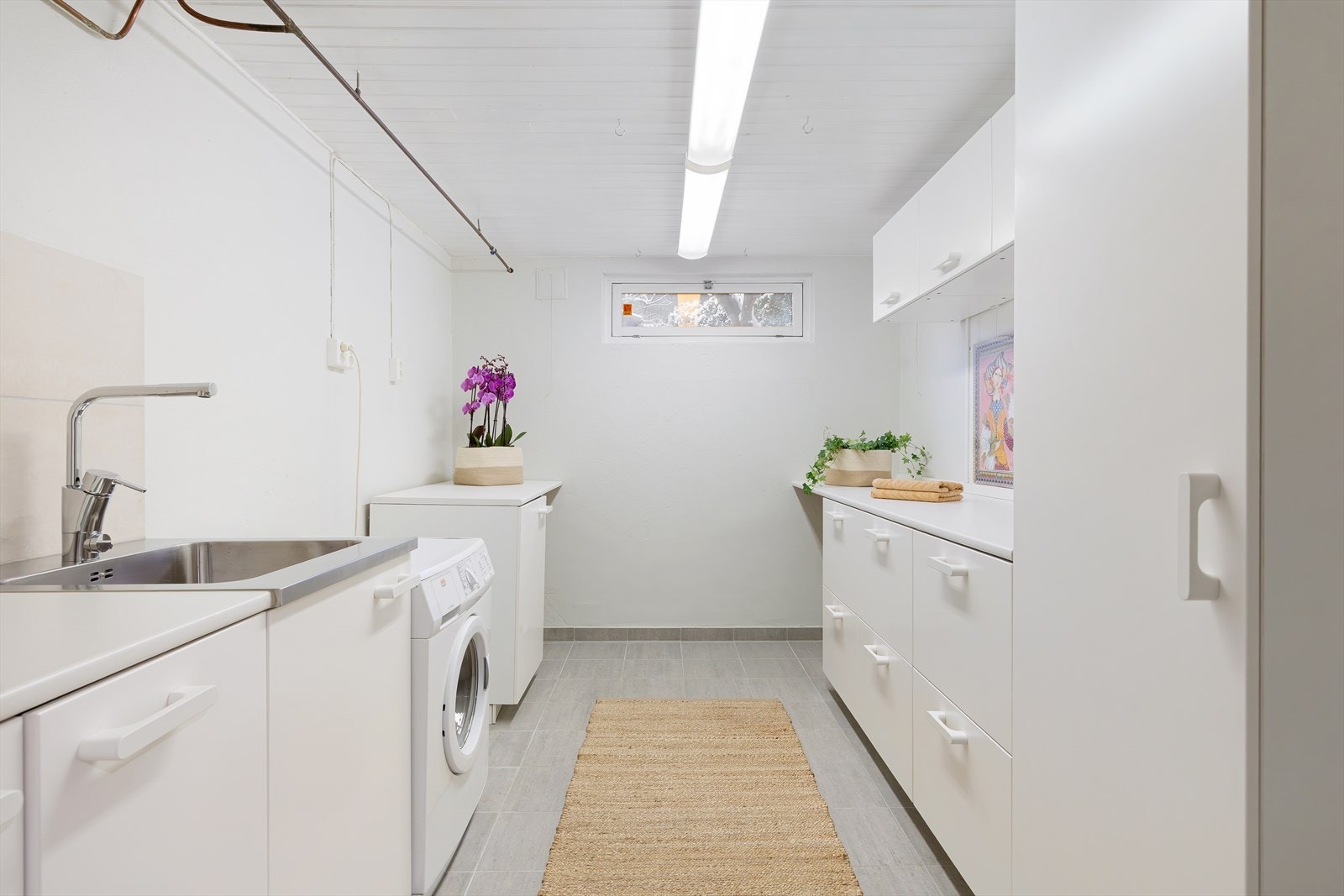 Her har du også et praktisk vaskerom som gjør klesvask og hverdagssysler lett tilgjengelig. Galleribilde