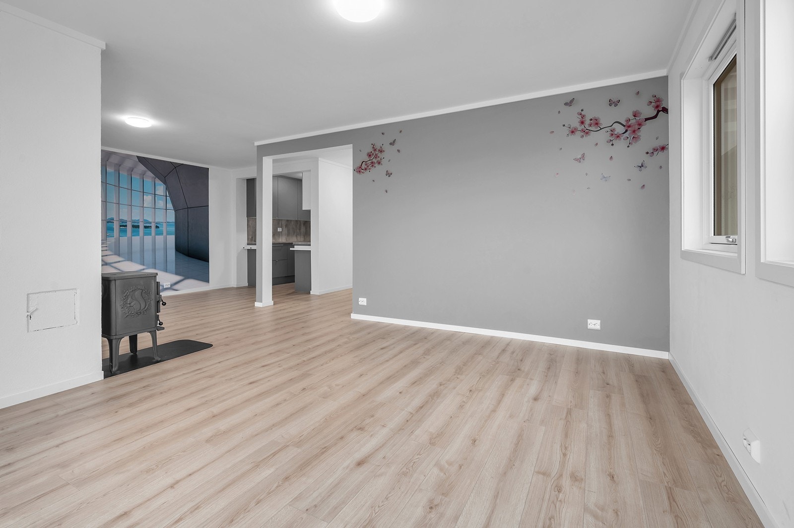 I stuen er det vedovn som oppvarmingskilde. Galleribilde