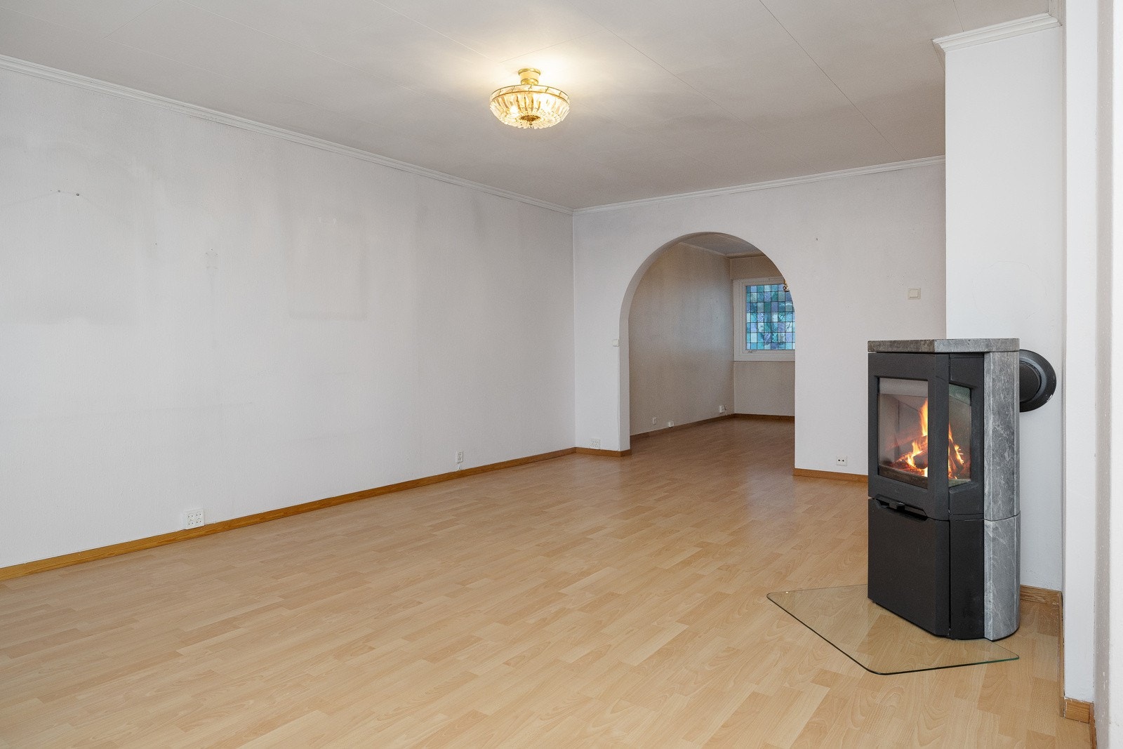 Arealet bak buen har tidligere vært et tredje soverom. Galleribilde