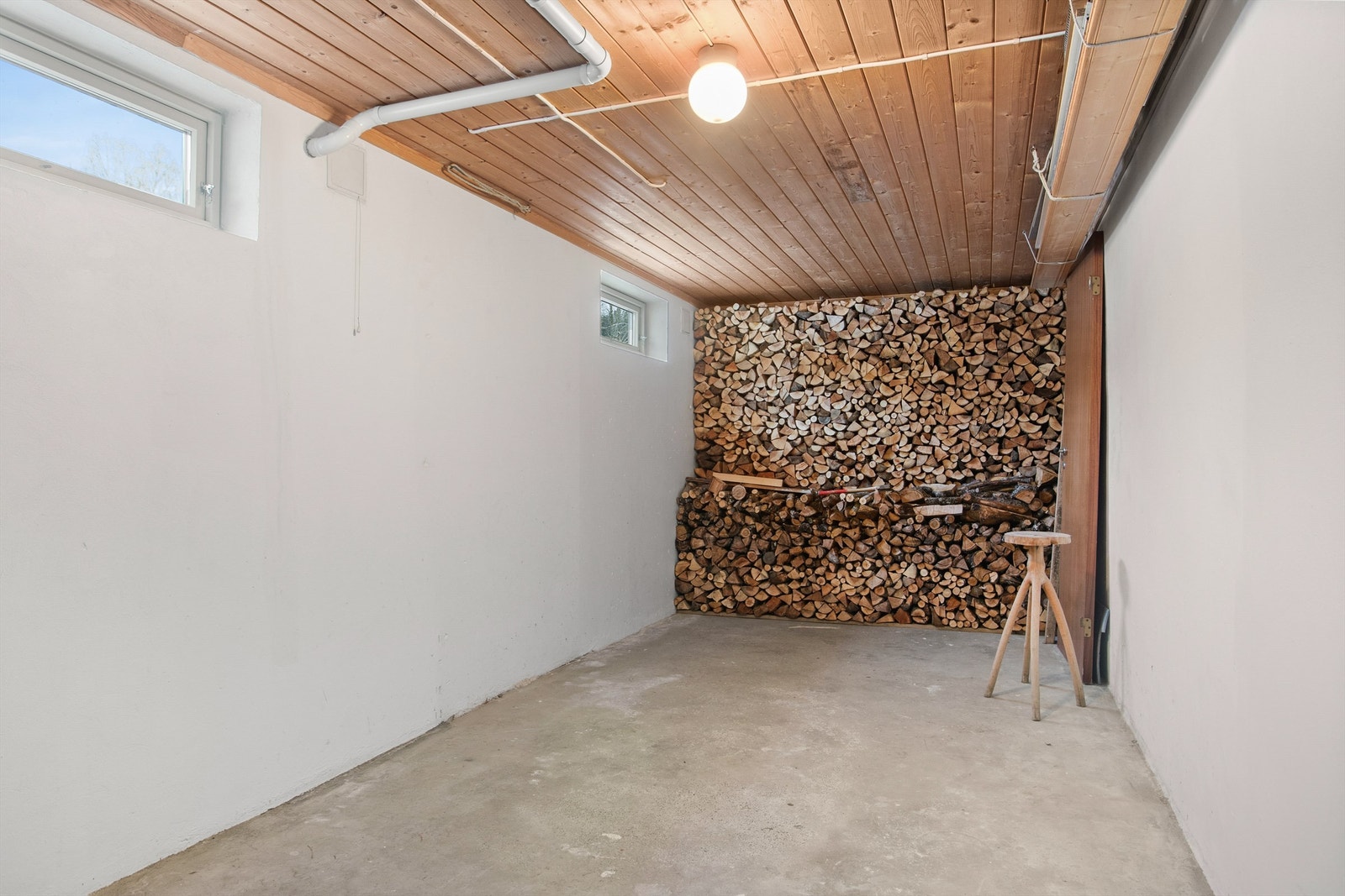 Vedbod i kjelleretasjen Galleribilde