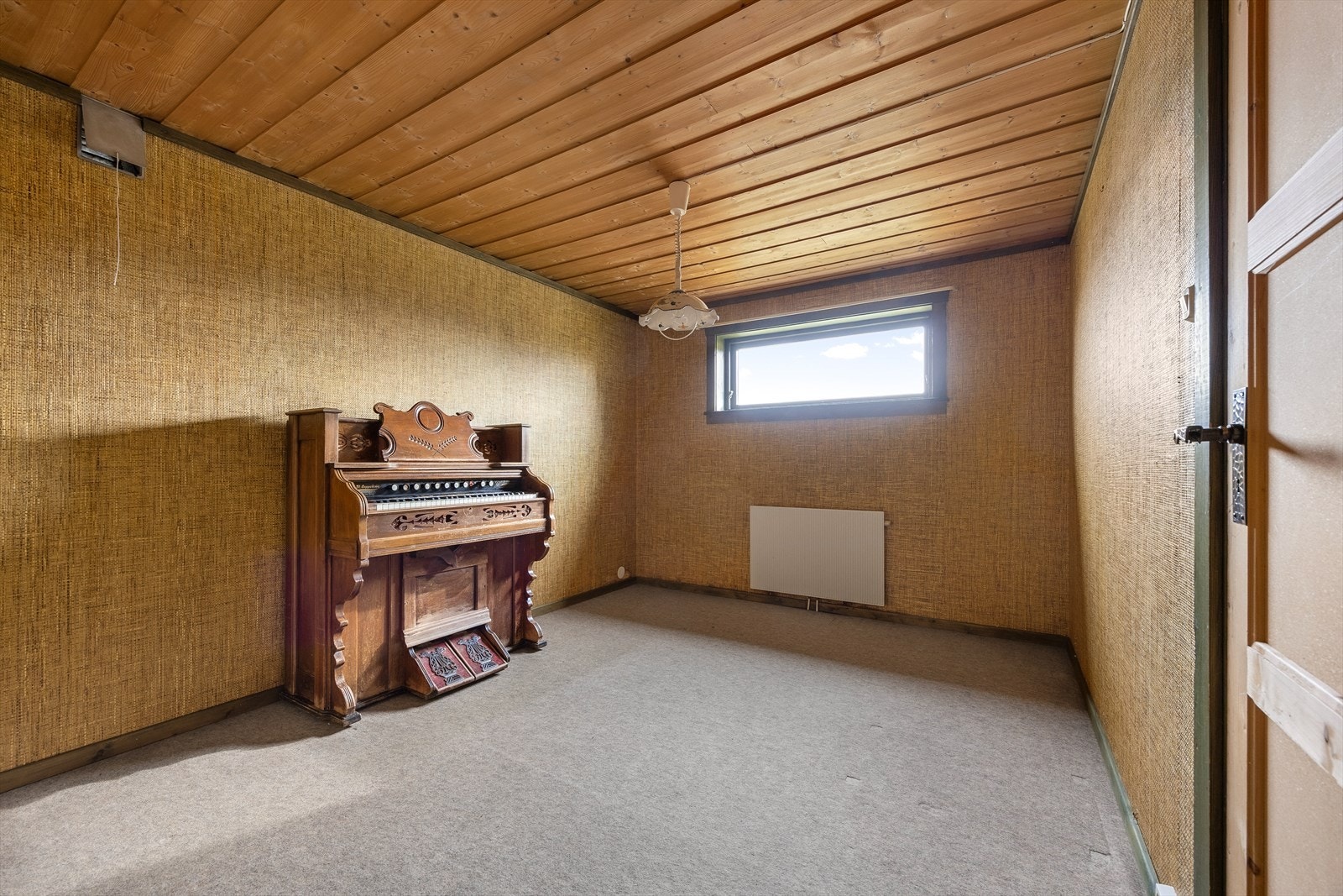 Kjelleren er også innredet med et kontor. Galleribilde