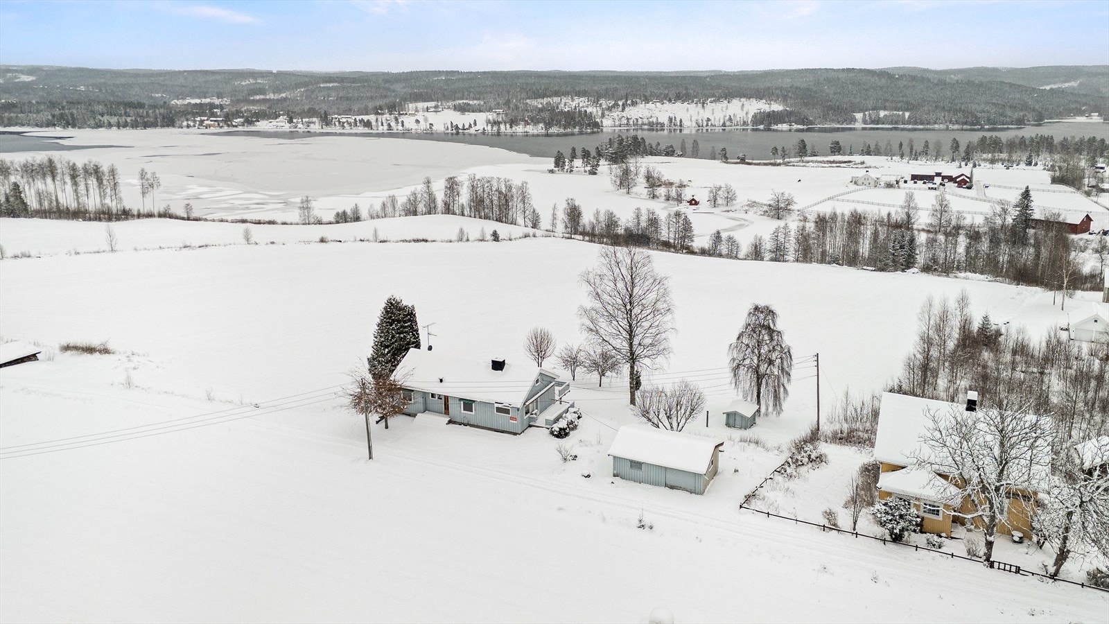 Oversiktsbilde av Kollbergveien 23 med omgivelser mot Rømsjøen Galleribilde