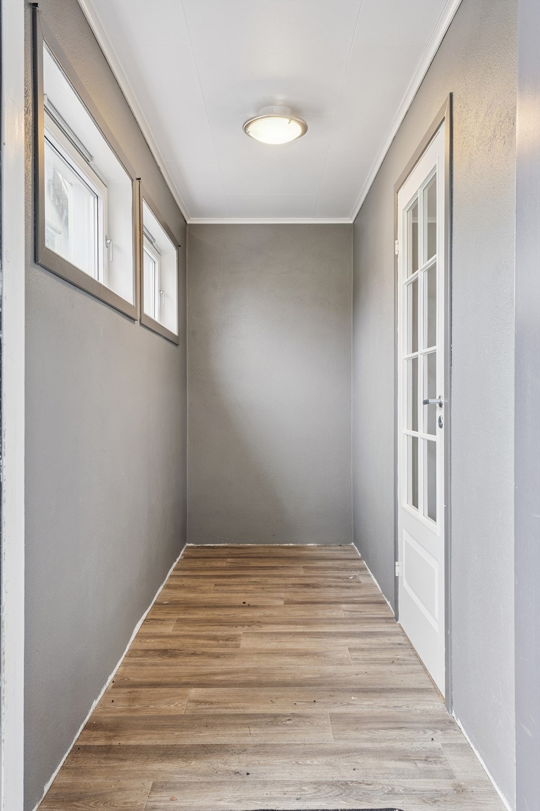 Gangen i første etasje binder sammen soverommene, badet og oppholdsrommene. Galleribilde