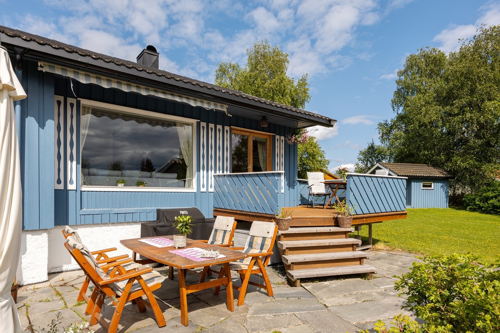 En markise sørger for effektiv solskjerming de varme sommerdagene. Galleribilde