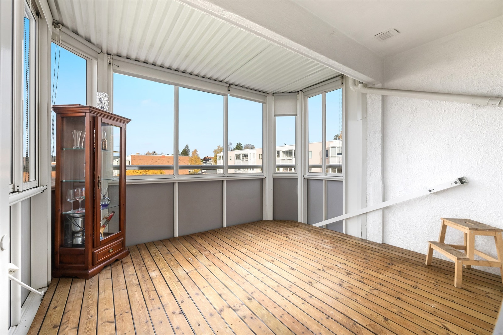 Innglasset balkongen kan fungere som en forlengelse av stuen Galleribilde