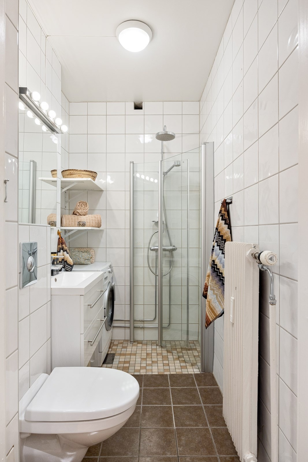 Flislagt baderom hvor det er lagt flis på flis i 2013. Galleribilde